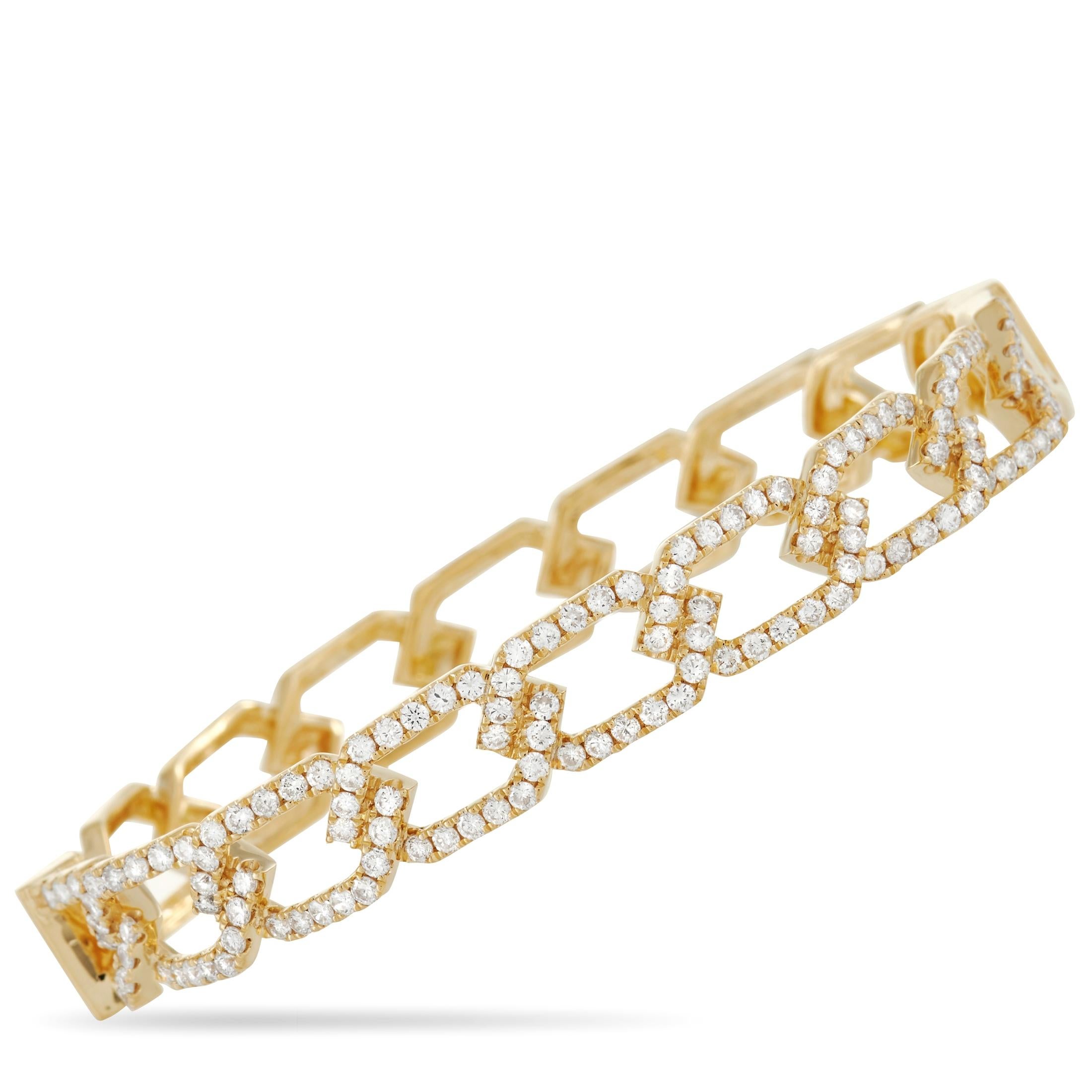 This classy LB Exclusive 18K Yellow Gold 2.03 ct Diamond Bracelet is sure to stand out. The bracelet is made with uniquely shaped intertwined links of 18K yellow gold that are set with 2.03 carats of round-cut diamonds. The bracelet measures 6.3