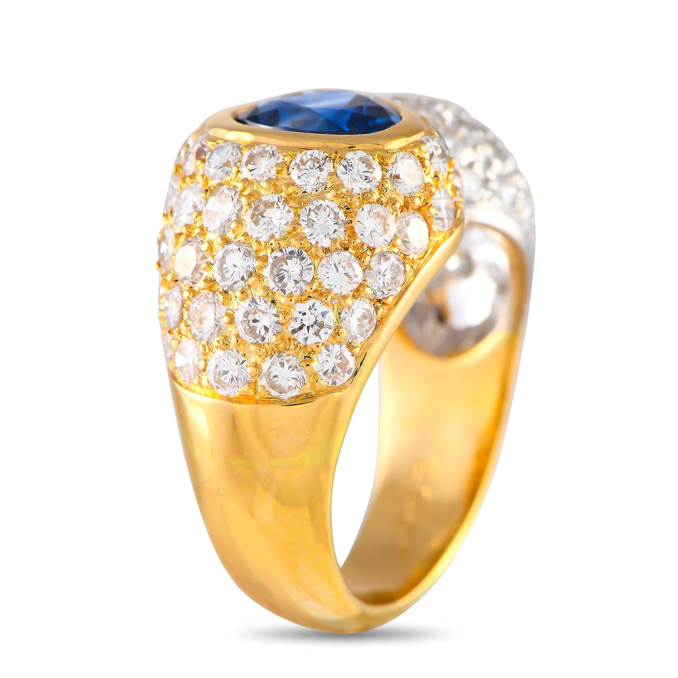 This opulent 18K Yellow Gold ring is nothing short of breathtaking. Inset Diamonds with a total weight of 2.53 carats allow it to effortlessly catch the light  but its the 1.73 carat GIA Certified heated Sapphire center stone that makes it simply