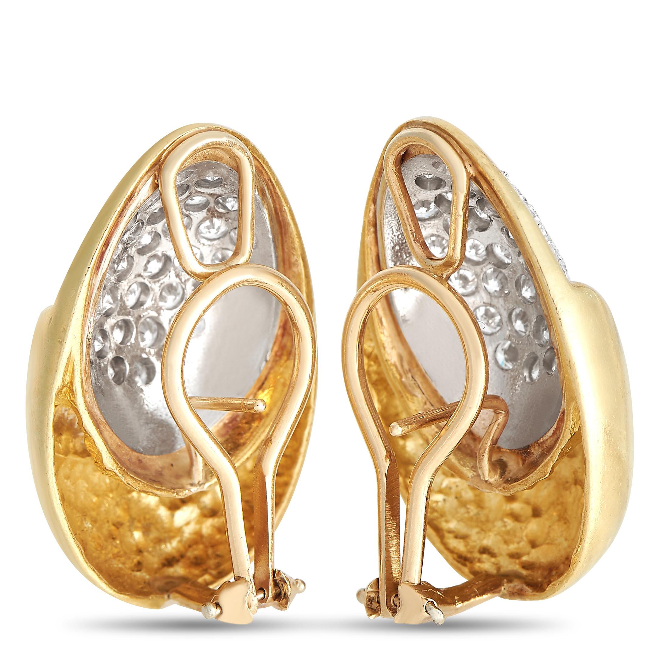 A beautiful, rounded setting crafted from 18K Yellow Gold provides a stunning foundation for these impeccably designed earrings. At their center, a cluster of inset diamonds totaling 3.0 carats allows them to radiate light along with every movement.