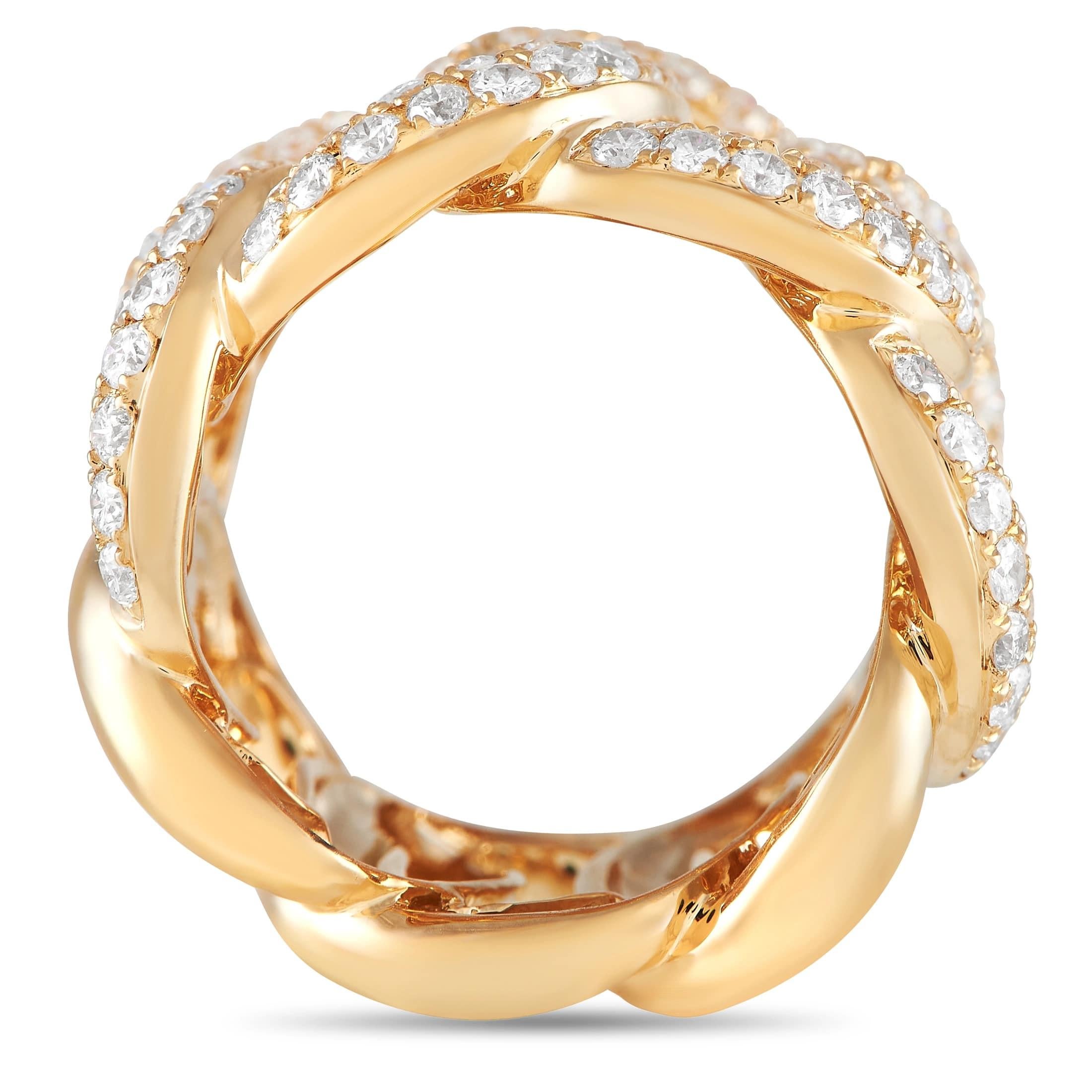 A fashion-forward statement ring that's sure to draw attention. Crafted in 18K yellow gold, the 18mm wide band features a series of interlocking rings traced with two rows of diamonds. Expect this ring to lend a hint of movement and edgy elegance to