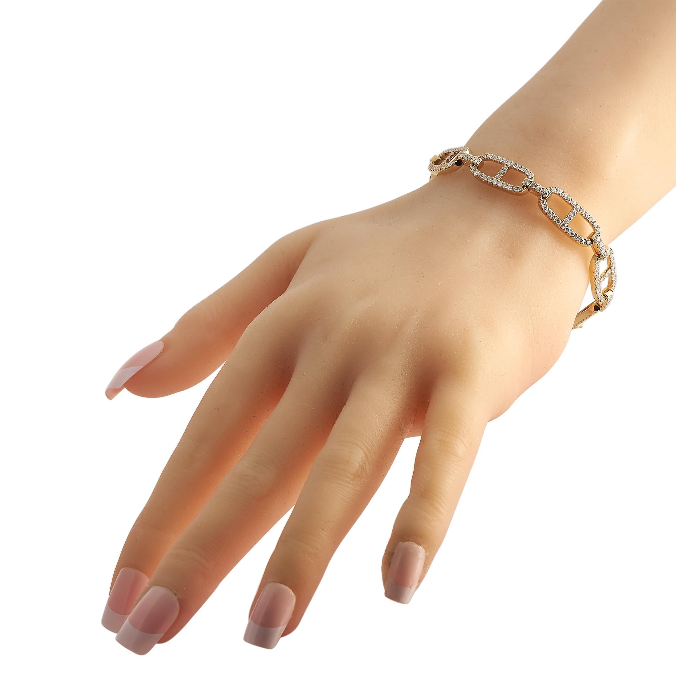 This 18K Yellow Gold bracelet possesses an understated elegance. Ideal for everyday wear, Diamonds with a total weight of 3.85 carats allow it to sparkle and shine along with every move you make. It measures 7.25 long and comes complete with secure