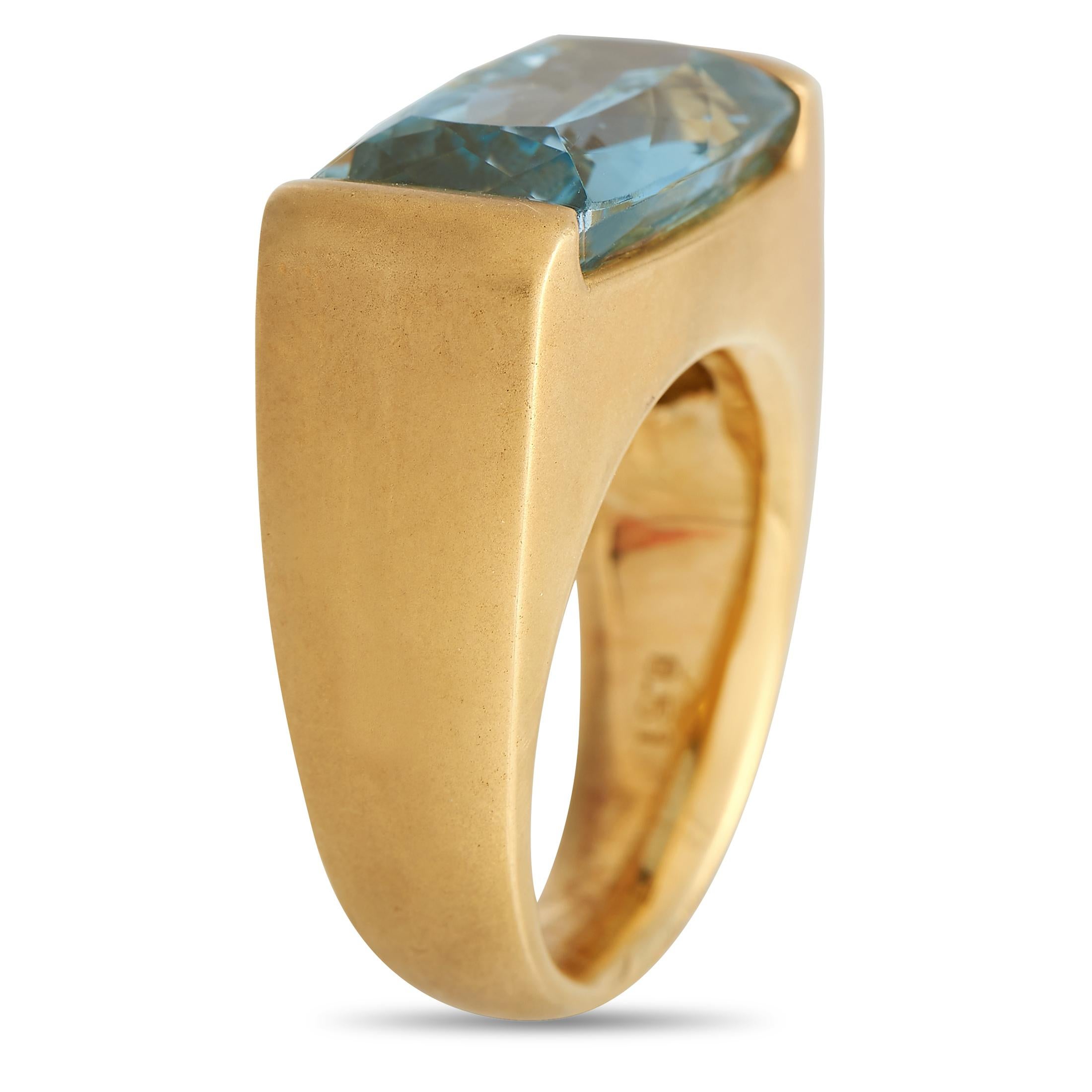 This sleek, sophisticated ring will continually capture your imagination. At the center of the minimalist 18K Yellow Gold setting, you\u2019ll find a breathtaking 8.51 carat Aquamarine gemstone. A 6mm band width and a 7mm top height make it a piece