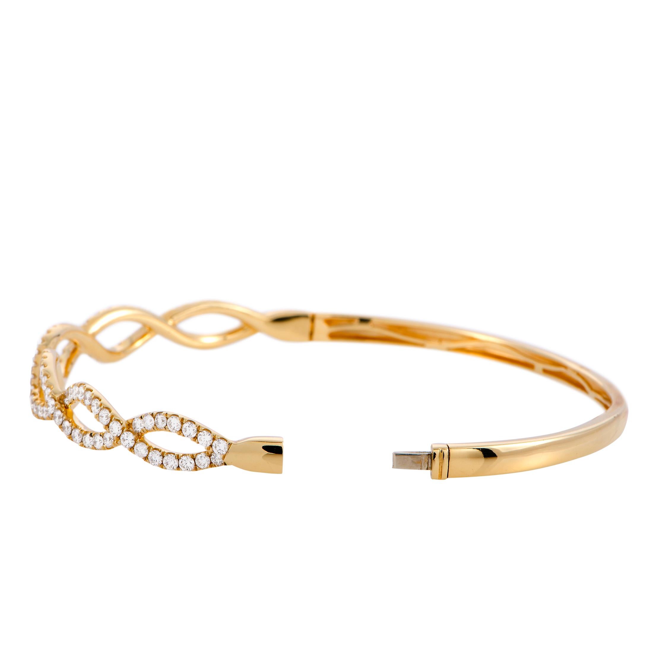 This LB Exclusive bangle bracelet is crafted from 18K yellow gold and weighs 11.4 grams, measuring 7.85” in length with a 2.50” diameter. The bracelet is set with diamond stones that amount to 1.66 carats.

Offered in brand new condition, this item