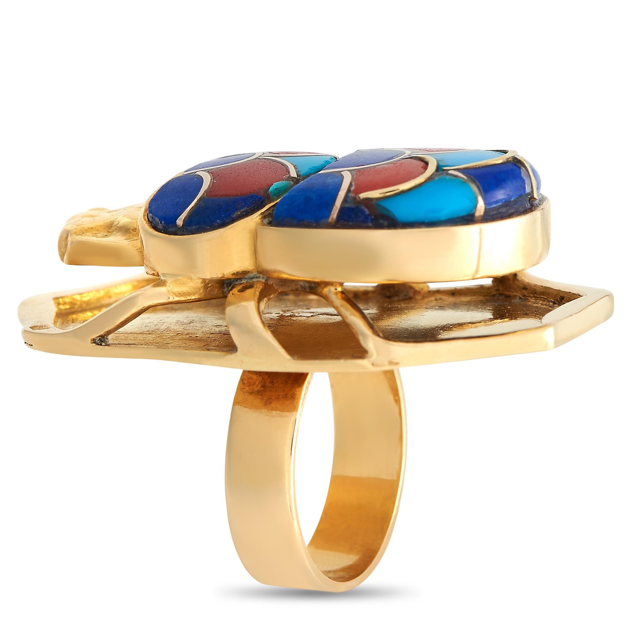 Thought to be a symbol of good fortune, this bold and beautiful Scarab cocktail ring might just draw luck's attention. The imposing finger accessory features a solid yellow-gold band measuring 5mm thick. Its top plate measures 25mm x 22mm and