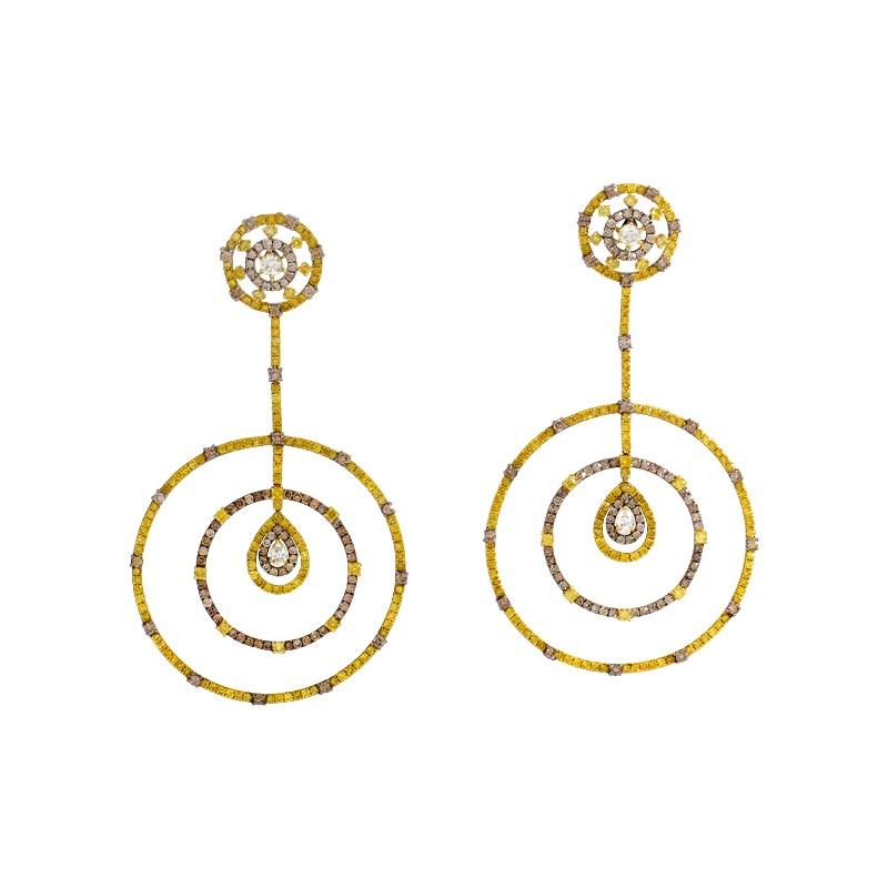 This hypnotic, spinning earring design compels and dazzles the eye. 18K yellow gold and black rhodium lend stylish frame to the radiance of 14.08ct diamonds.