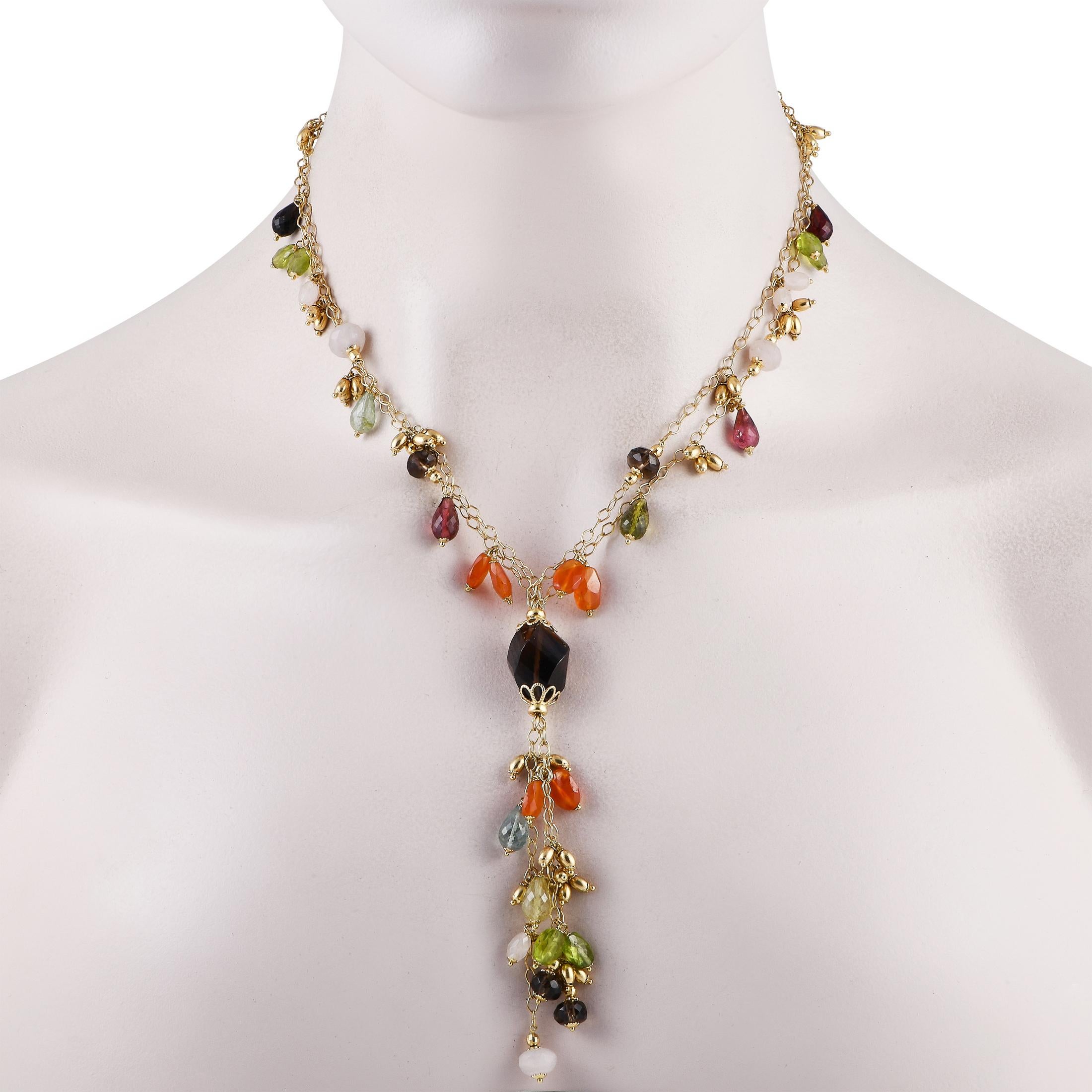An array of colorful gemstones come together in perfect harmony on this exciting 18K Yellow Gold necklace. Designed for anyone who isn’t afraid of making a statement, this Y-shaped necklace features a 17” chain and a 4” dangling chain at the center.