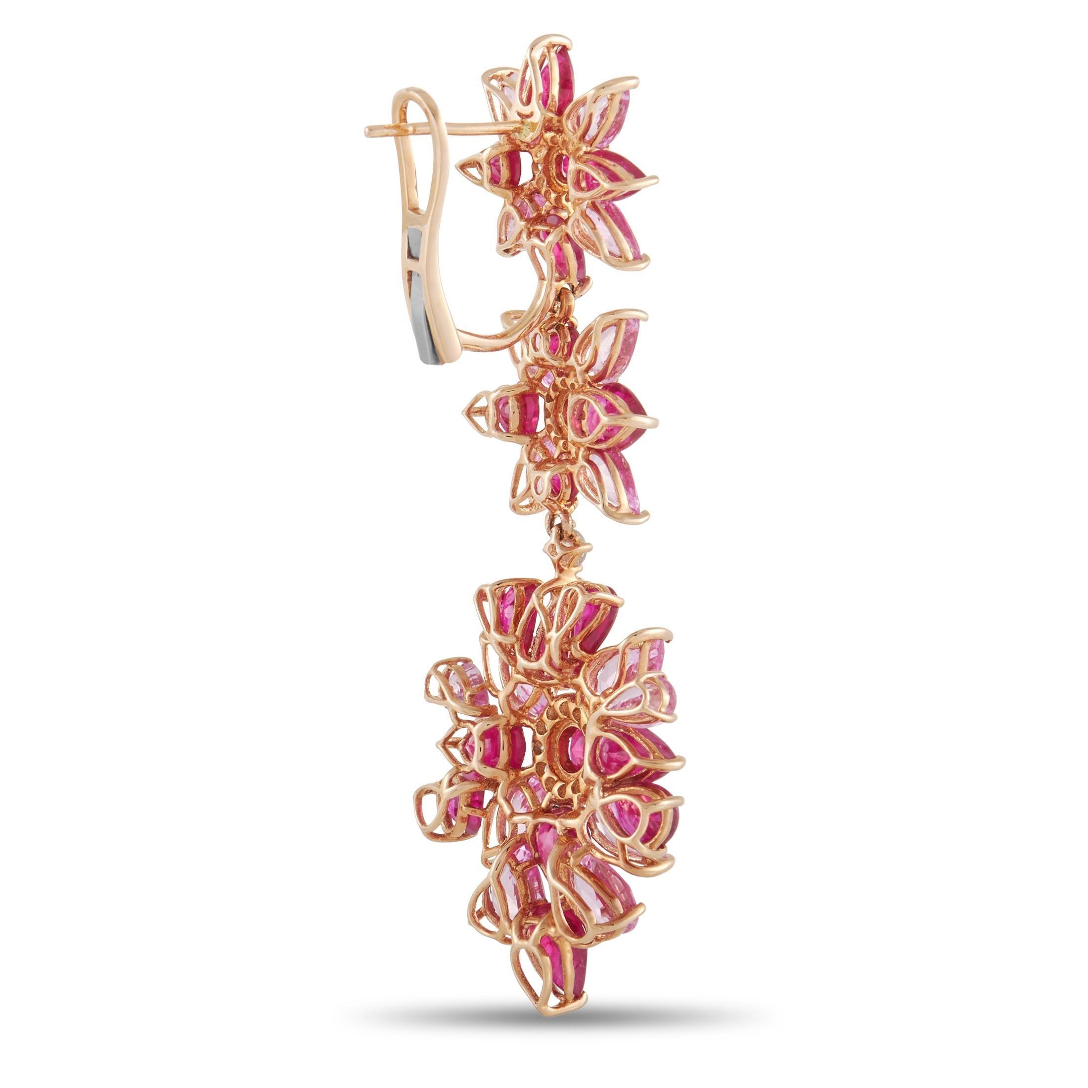 Express your personality through this pair of floral statement earrings. Fashioned in 18K rose gold and decorated with diamonds, rubies, and sapphires, these blushing pink floral drop earrings will give a luxuriously romantic twist to whatever you