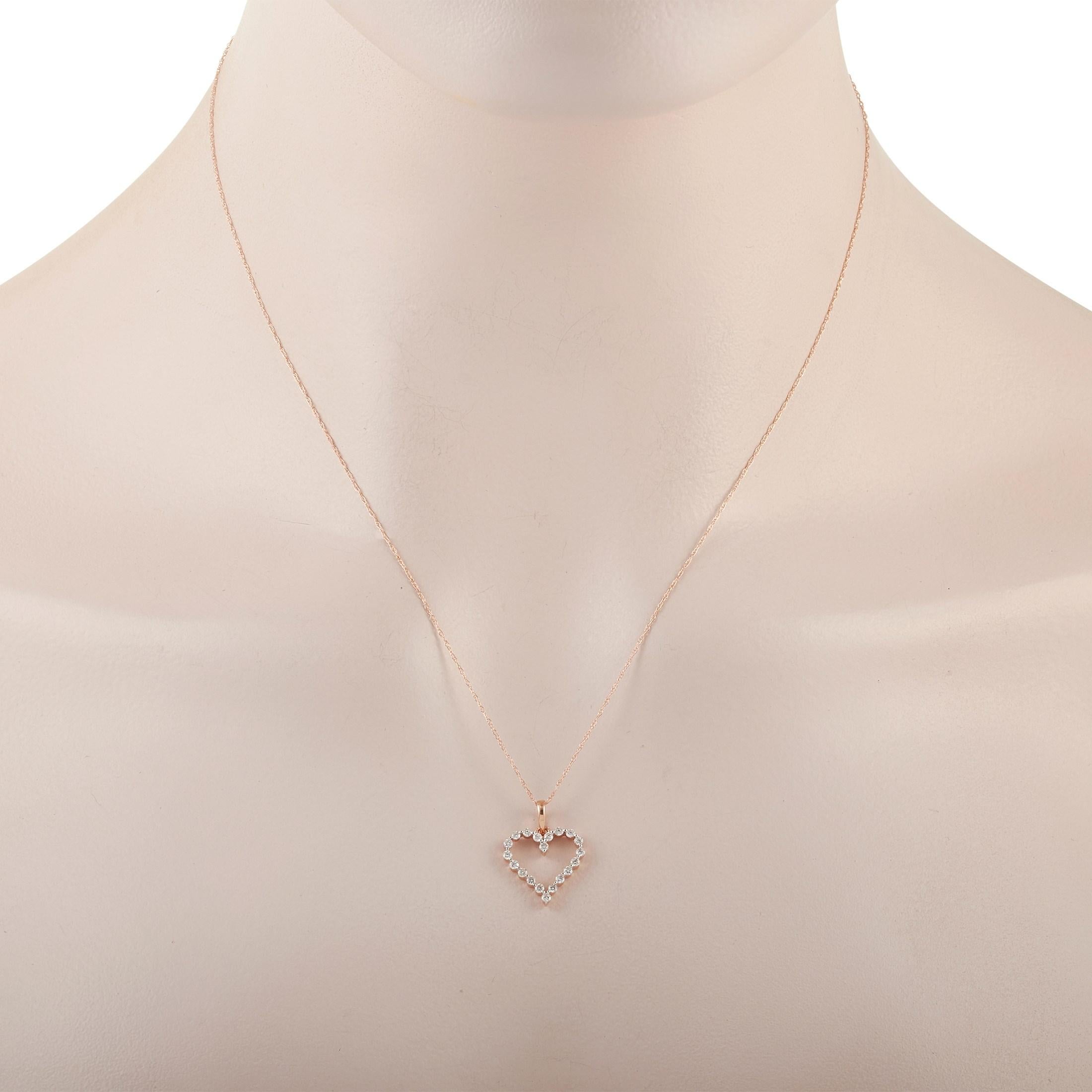 This LB Exclusive 14K Rose Gold Diamond Heart Pendant Necklace features a delicate 14K Rose Gold chain measuring 17 inches in length. The necklace features a heart-shaped pendant set with 0.33 carats of round-cut diamonds. The pendant measures 0.75