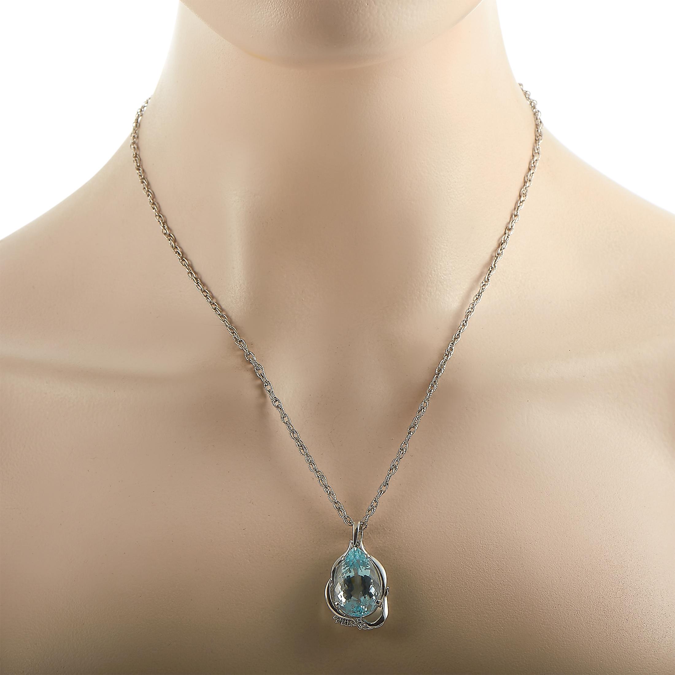 This LB Exclusive necklace is made of platinum and embellished with a 14.85 ct aquamarine and a total of 0.05 carats of diamonds. The necklace weighs 17.7 grams and boasts a 19” chain and a pendant that measures 1.25” in length and 0.75” in width.
