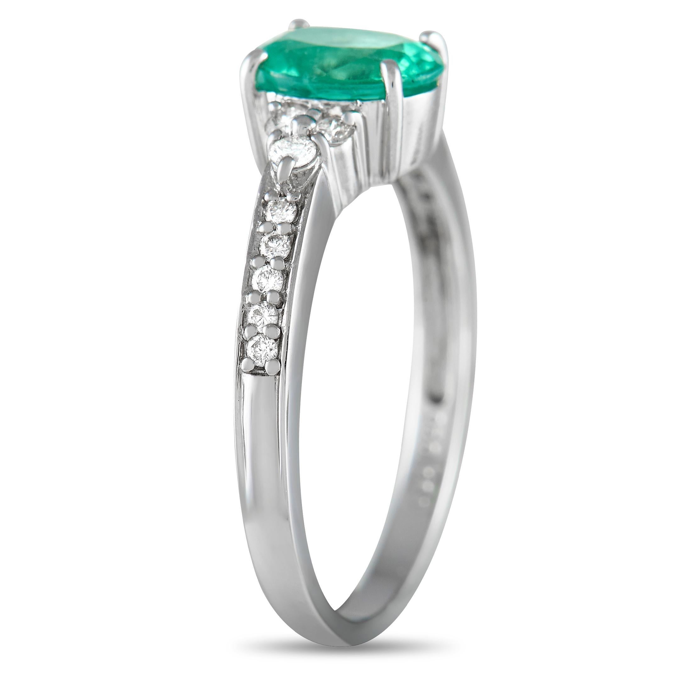 There’s something simple, elegant, and understated about this luxury ring. Sparkling diamonds with a total weight of 0.20 carats accent the 1mm wide Platinum band, highlighting the beauty of the 1.08 carat oval-shaped Emerald center stone. This
