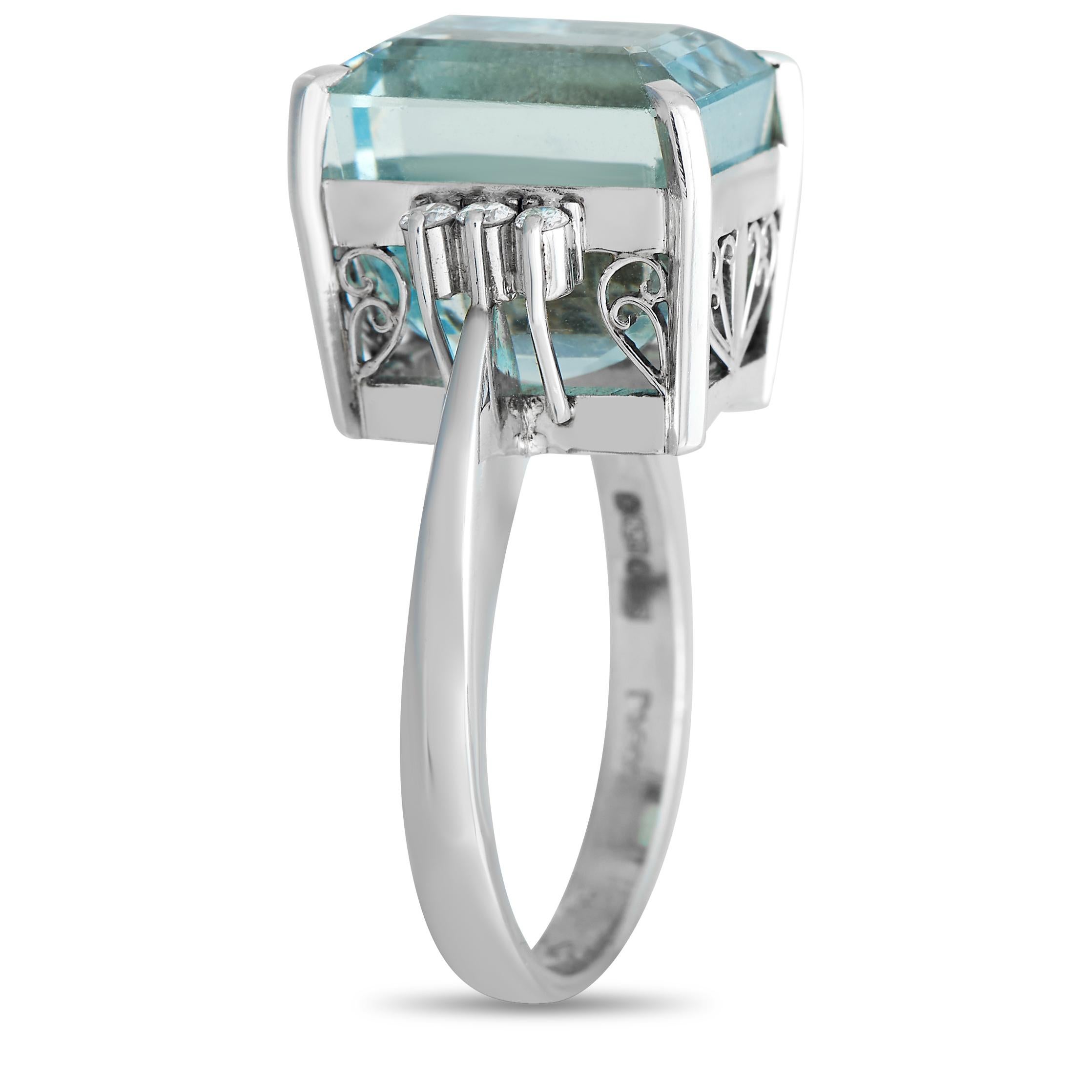 Sure to mesmerize is this aquamarine and diamond ring in everlasting platinum The pinched shank measures 2mm thick and has a graceful profile. It is topped with a sizeable 11.49 carat aquamarine in a step-cut, secured by a four-prong basket setting.