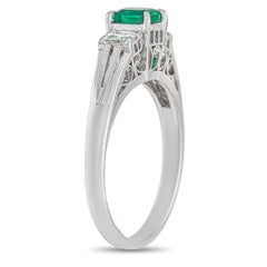 LB Exclusive Platinum 0.34 Ct Diamond and 0.33 Ct Emerald Ring