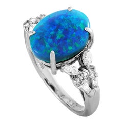 LB Exclusive Platinum 0.35 Carat Diamond and Opal Oval Ring