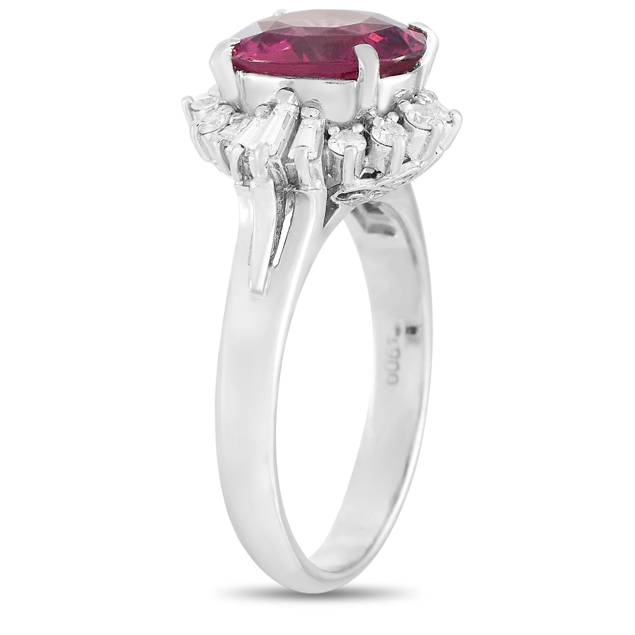 This gorgeous LB Exclusive Platinum 0.36 ct Diamond and Tourmaline Ring is made with platinum and set with a total of 0.36 carats of baguette and round diamonds forming a halo around the stunning 2.29 carat tourmaline center stone. The ring has a