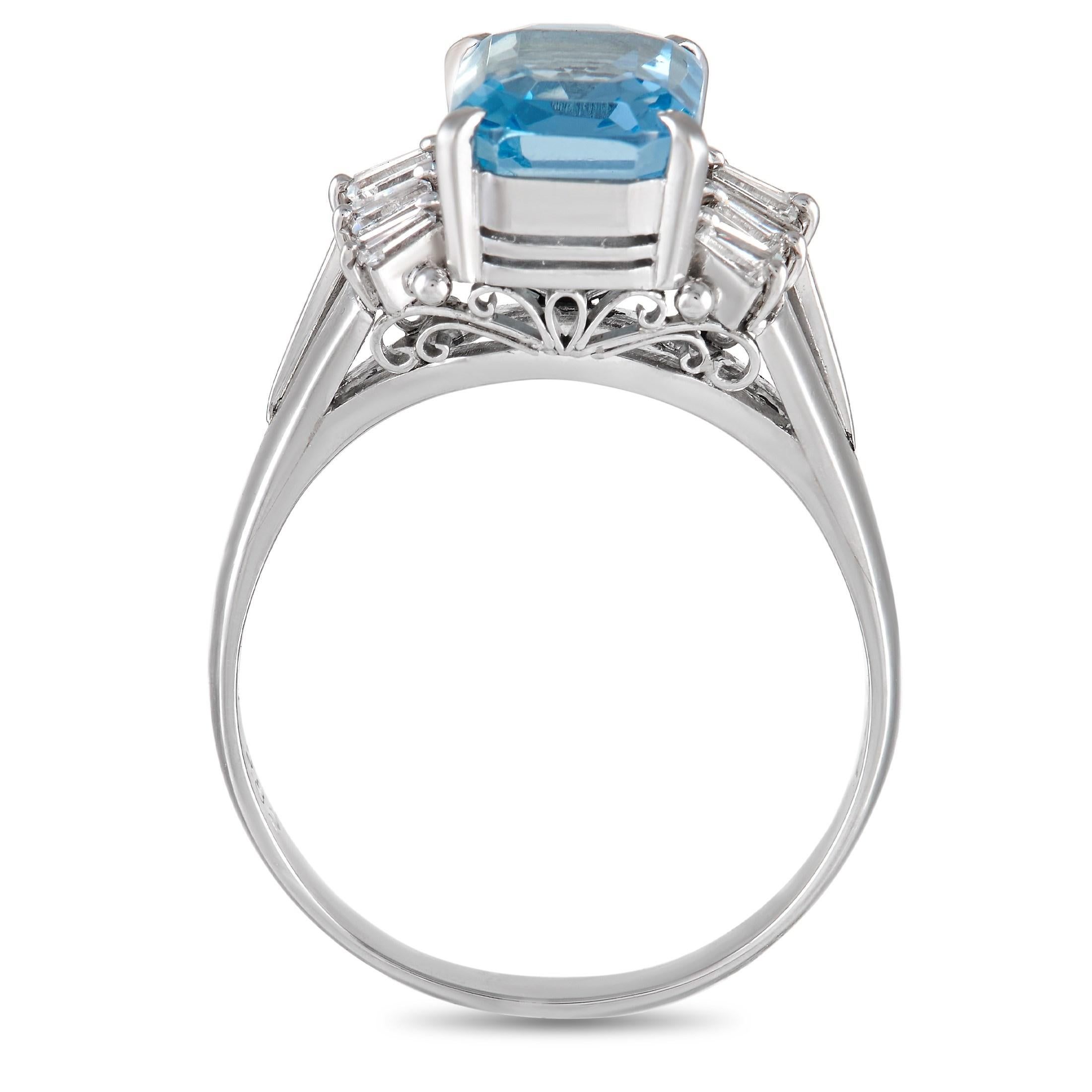 A simple Platinum setting sets the stage for this ring’s breathtaking collection of gemstones. At the center, a bright blue 2.82 carat Aquamarine gemstone adds a pop of color to the understated design. Diamond accents with a total weight of 0.38