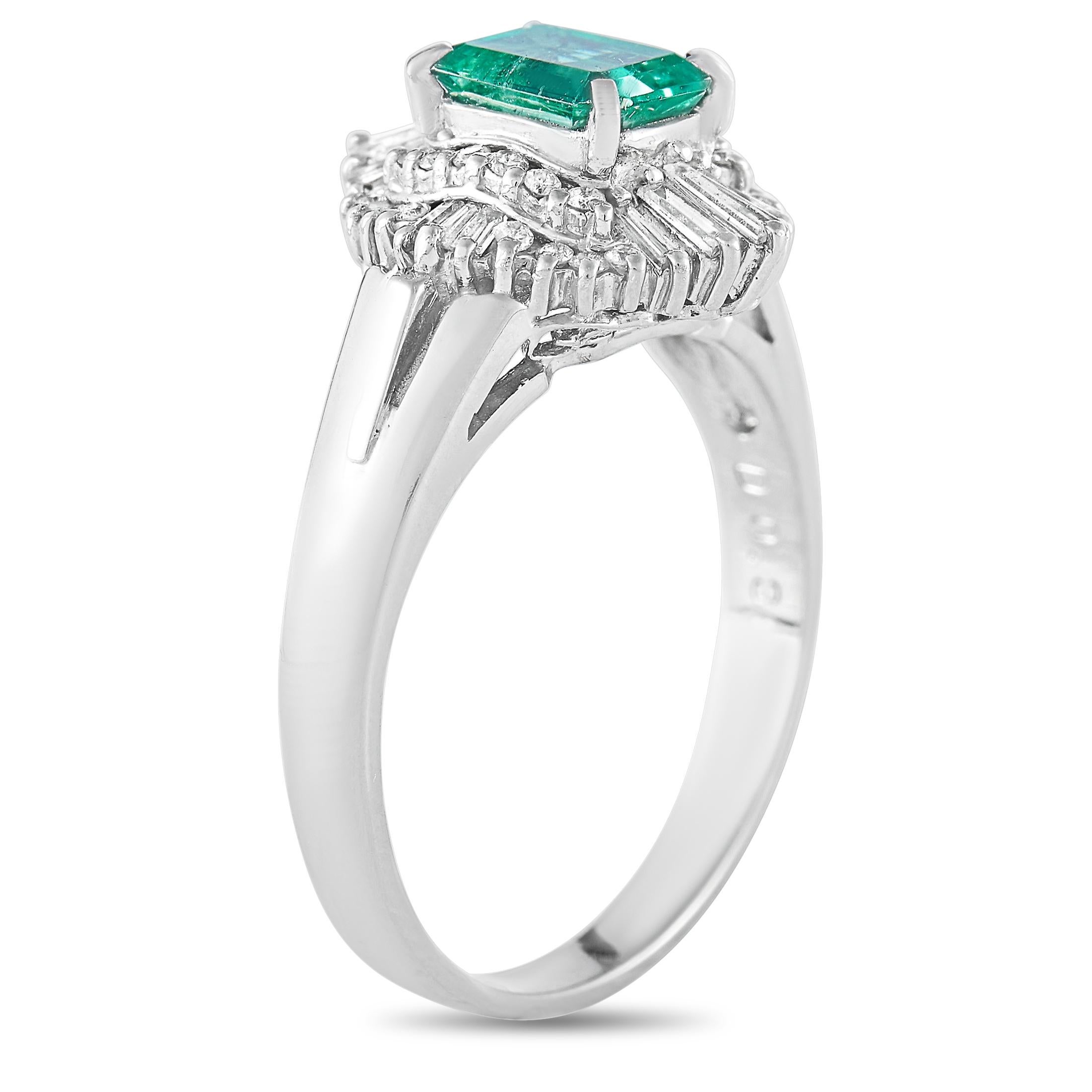 This LB Exclusive ring is crafted from platinum and weighs 6.4 grams. It boasts band thickness of 2 mm and top height of 7 mm, while top dimensions measure 11 by 14 mm. The ring is set with a 0.91 ct emerald and a total of 0.38 carats of diamonds.
