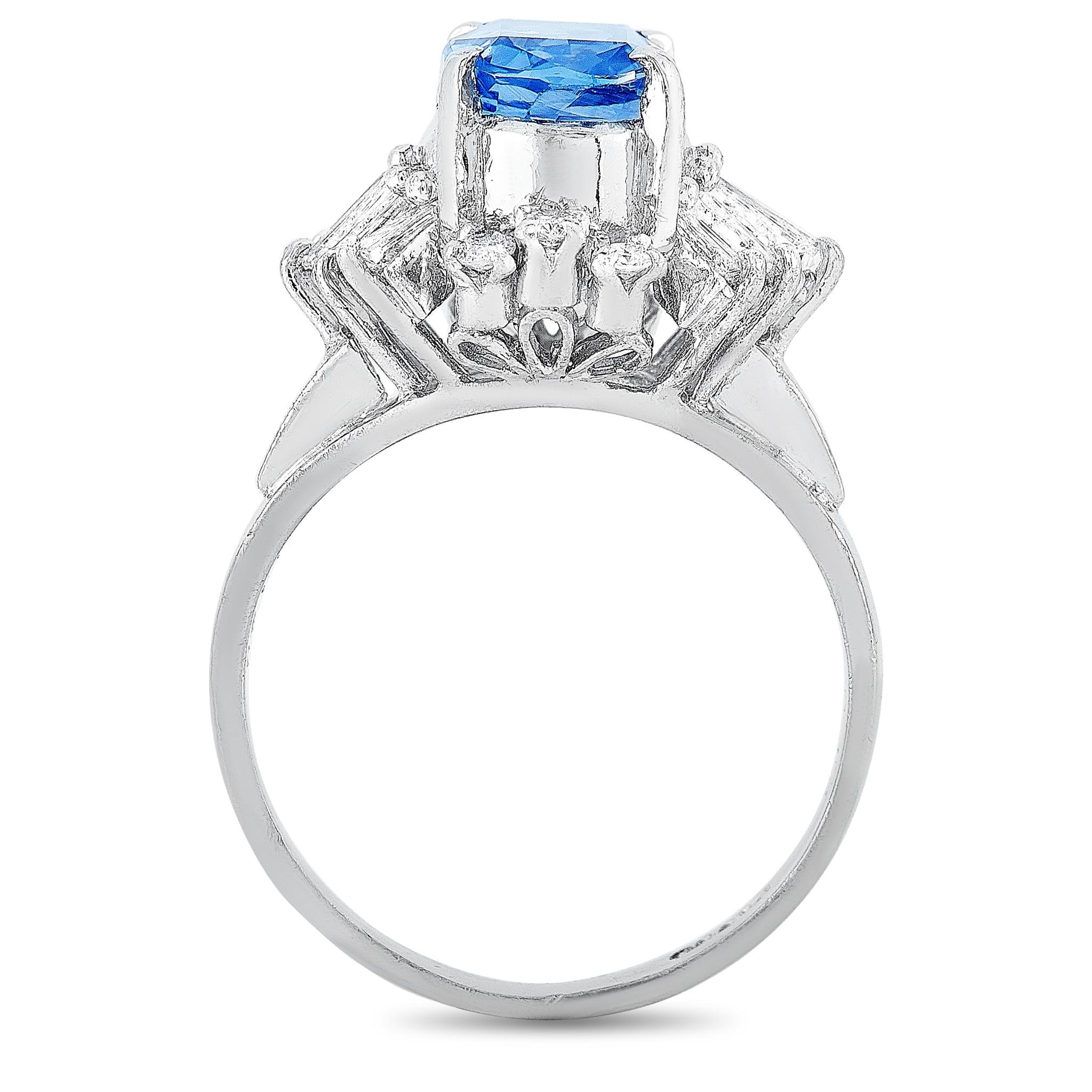 This LB Exclusive ring is crafted from platinum and weighs 6 grams, boasting band thickness of 2 mm and top height of 10 mm, while top dimensions measure 15 by 11 mm. The ring is set with a 2.52 ct sapphire and a total of 0.47 carats of diamonds.
 
