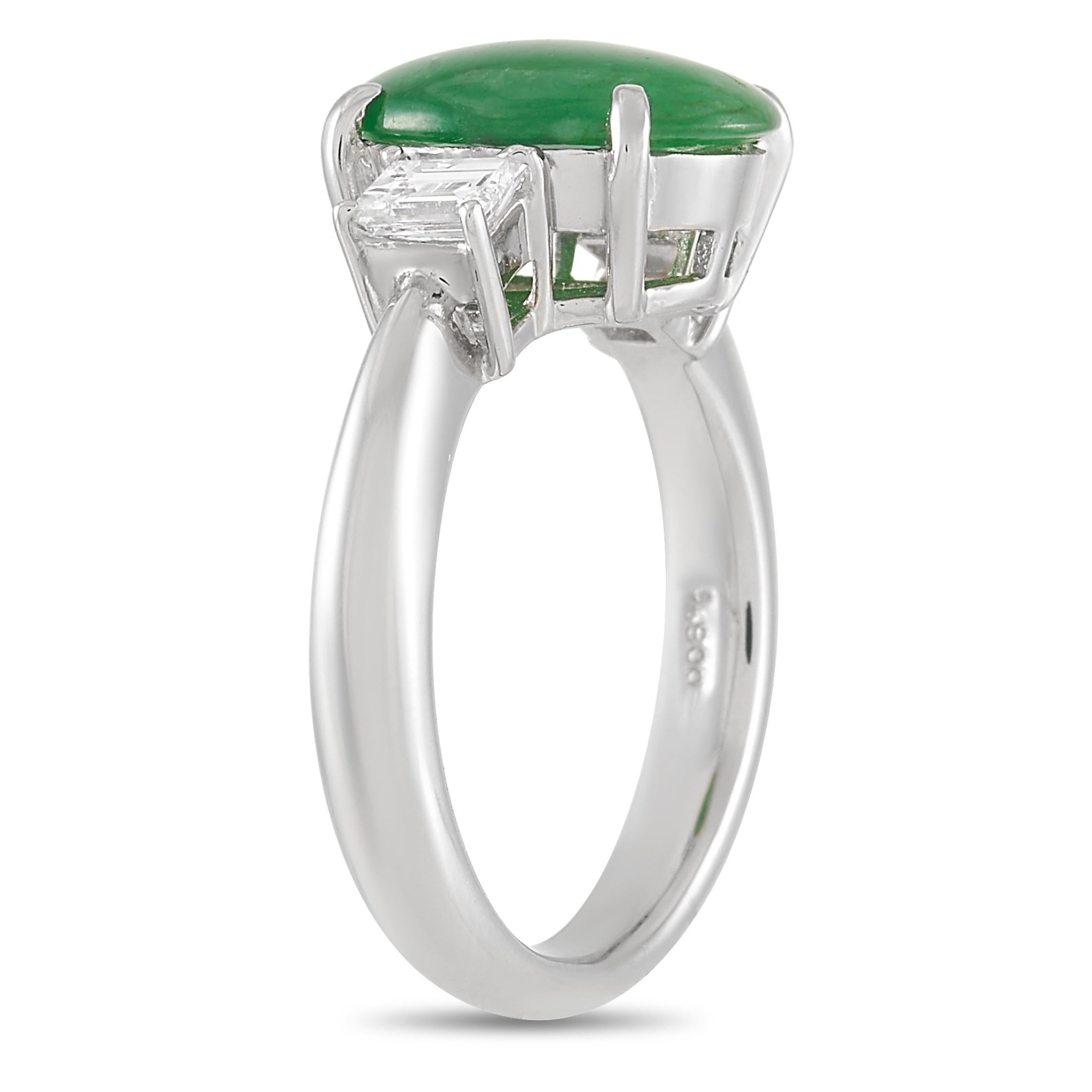This classy LB Exclusive Platinum 0.51 ct Diamond 3.60 ct Jade Ring is simple but unique. The band is crafted of platinum and set with an oval 3.60 carat jade held in place by four prongs and flanked on either side by baguette diamonds totaling 0.51