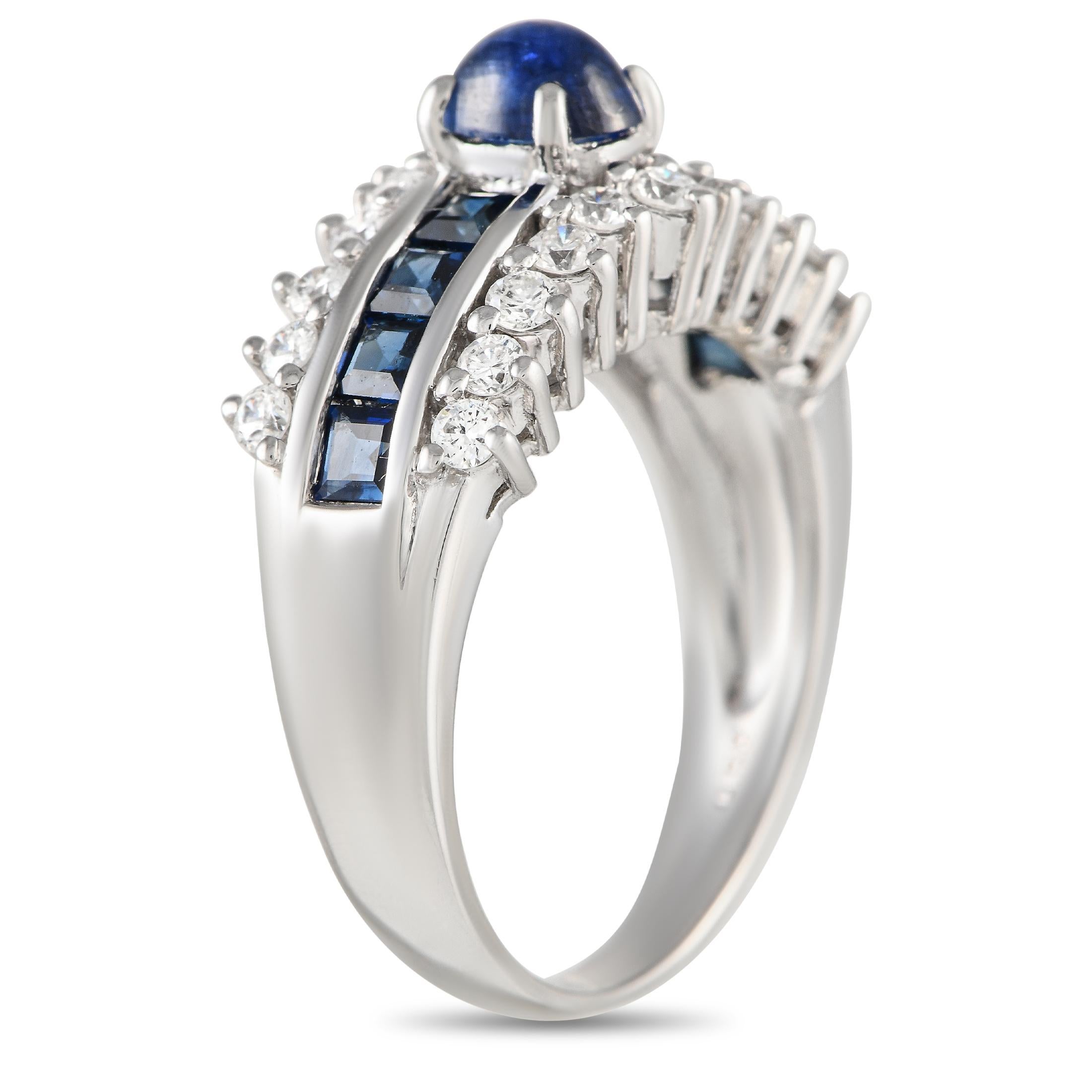 This dynamic luxury ring is impossible to ignore. Sapphire gemstones with a total weight of 1.55 carats make a statement at the center of the simple Platinum setting, which features a 3mm wide band a top height measuring 8mm. Sparkling diamonds with