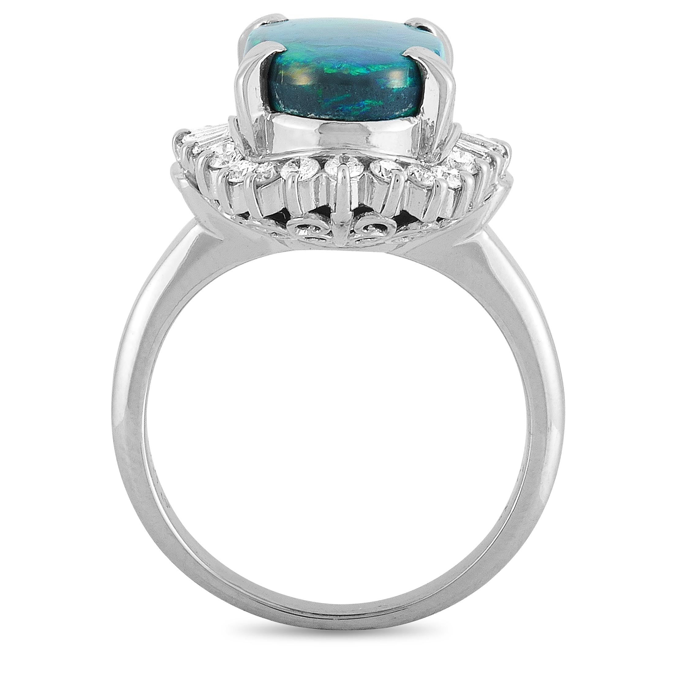 This LB Exclusive ring is crafted from platinum and weighs 9.7 grams. It is set with an opal that weighs 3.64 carats and a total of 0.53 carats of diamonds. The ring boasts band thickness of 3 mm and top height of 9 mm, while top dimensions measure