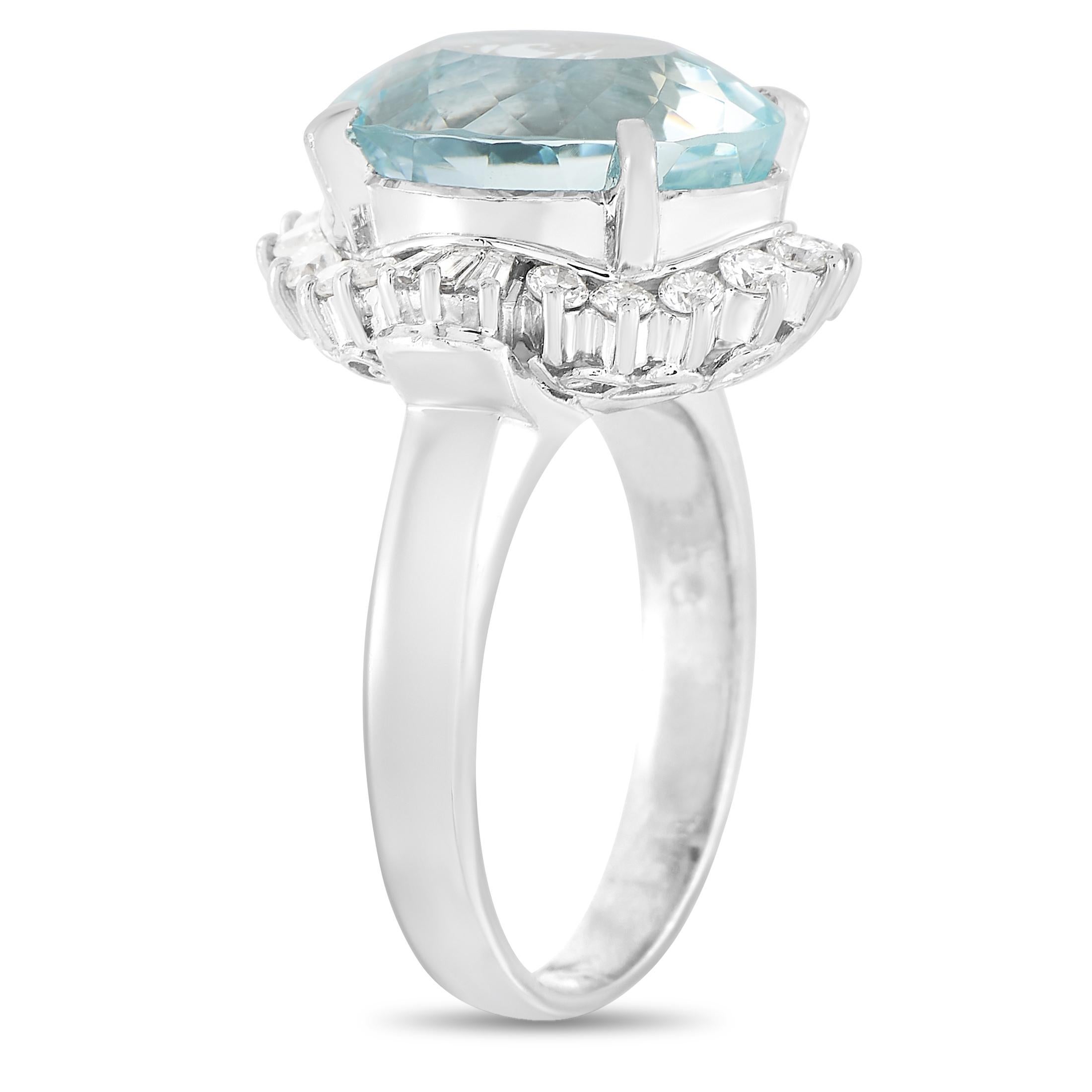 This gorgeous LB Exclusive Platinum 0.53 ct Diamond and Aquamarine Ring is made with platinum and set with a total of 0.53 carats of baguette and round diamonds forming a halo around the 5.55 carat oval aquamarine center stone. The ring has a band