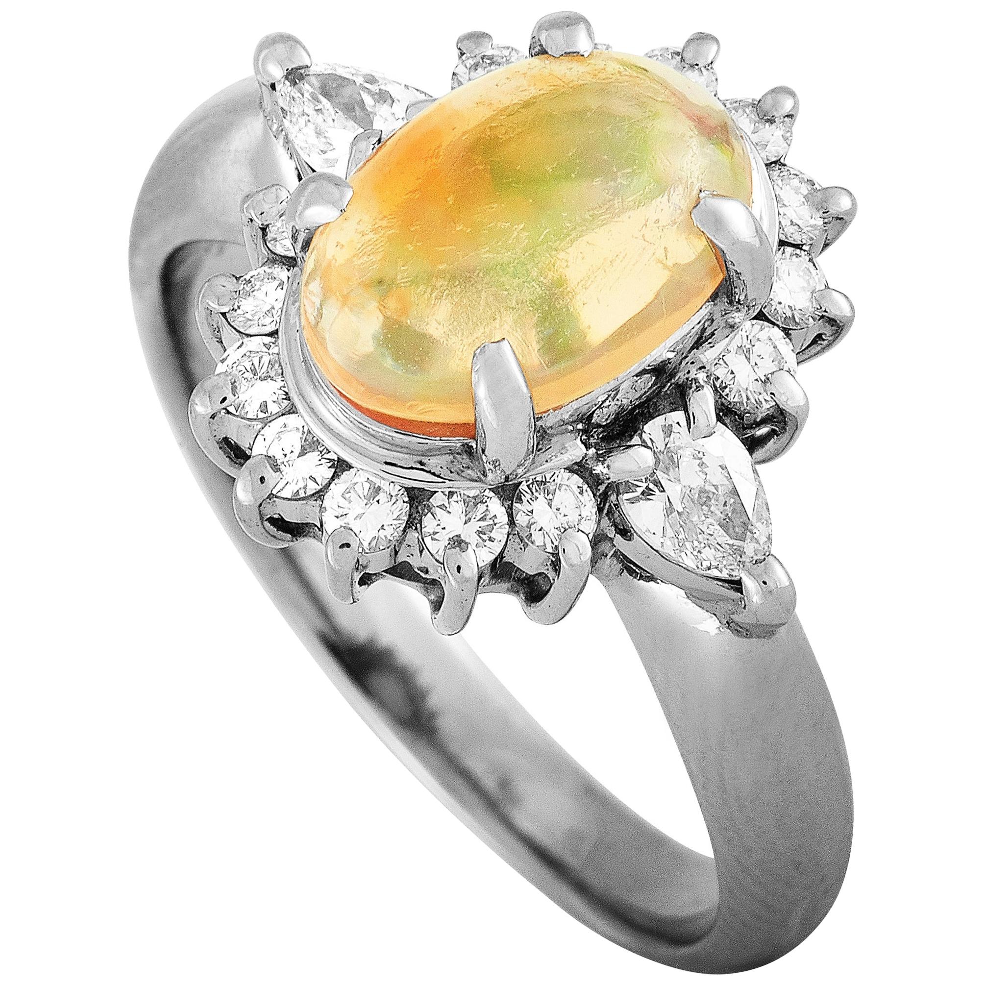 LB Exclusive Platinum 0.54 Carat Round and Pear Diamond and Opal Ring