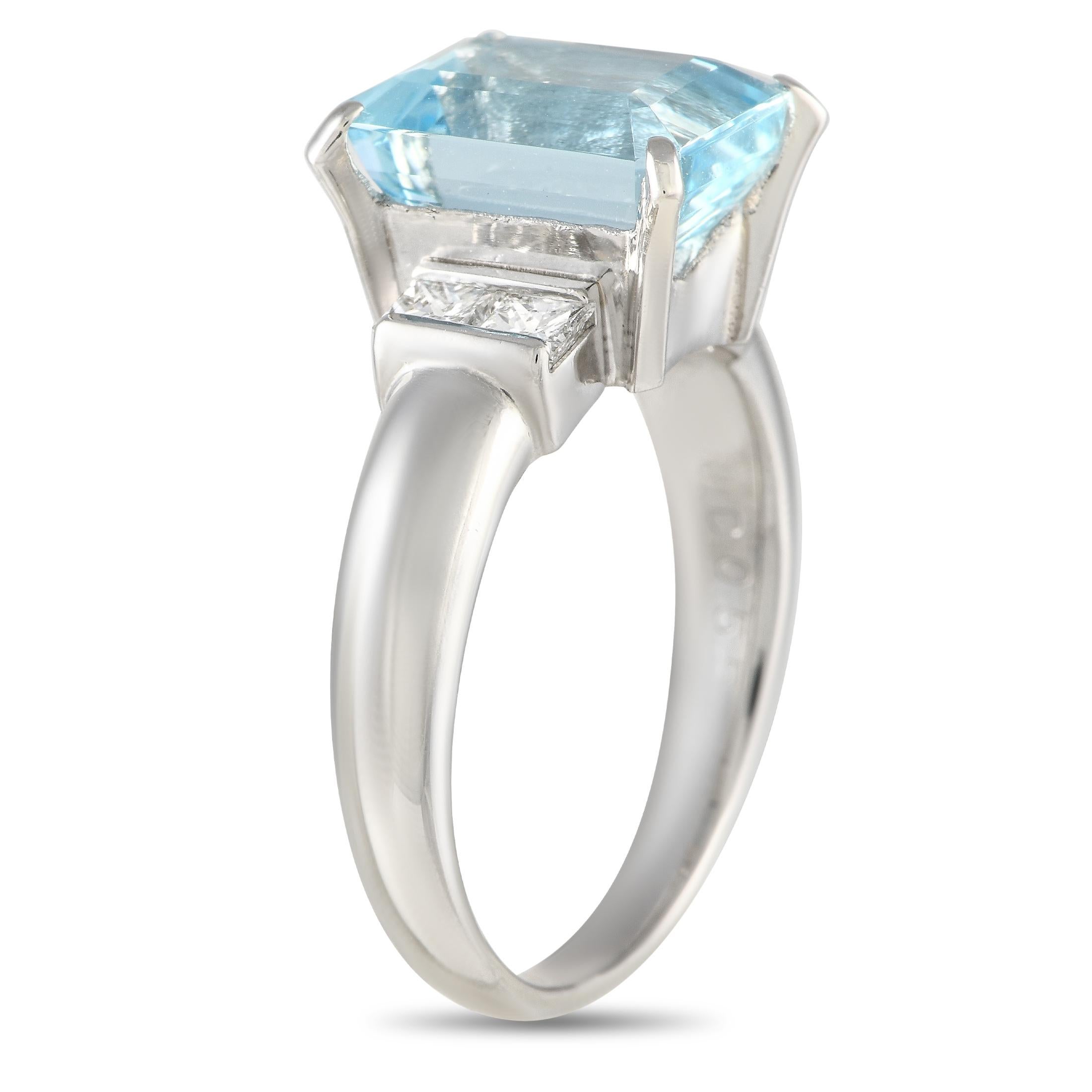 A simple Platinum setting provides the perfect foundation for this luxurious ring. The captivating 4.49 Aquamarine center stone is flanked by Diamond accents with a total weight of 0.55 carats. This piece features a 3mm band width and an 8mm top
