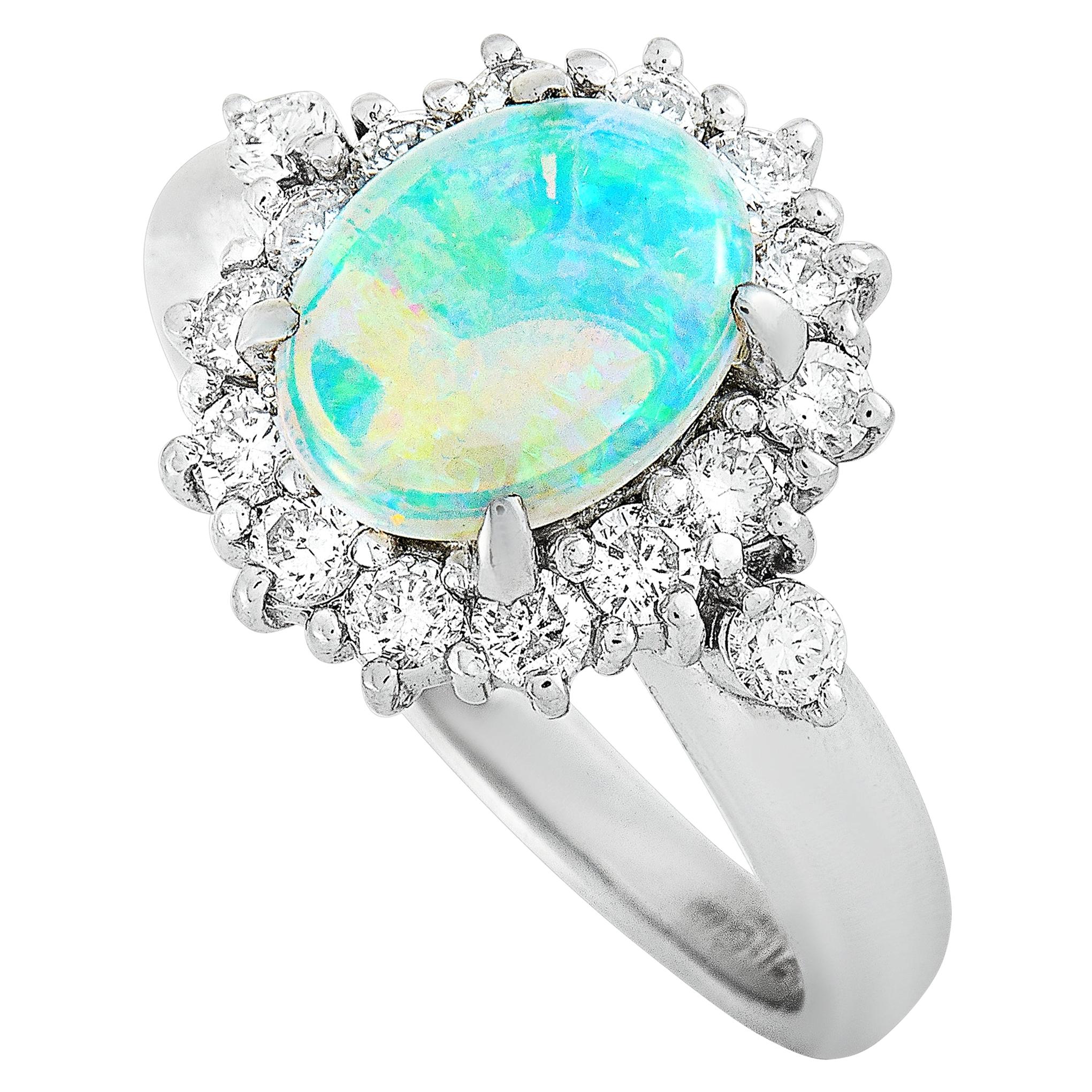 LB Exclusive Platinum 0.57 Carat Diamond and Opal Oval Ring