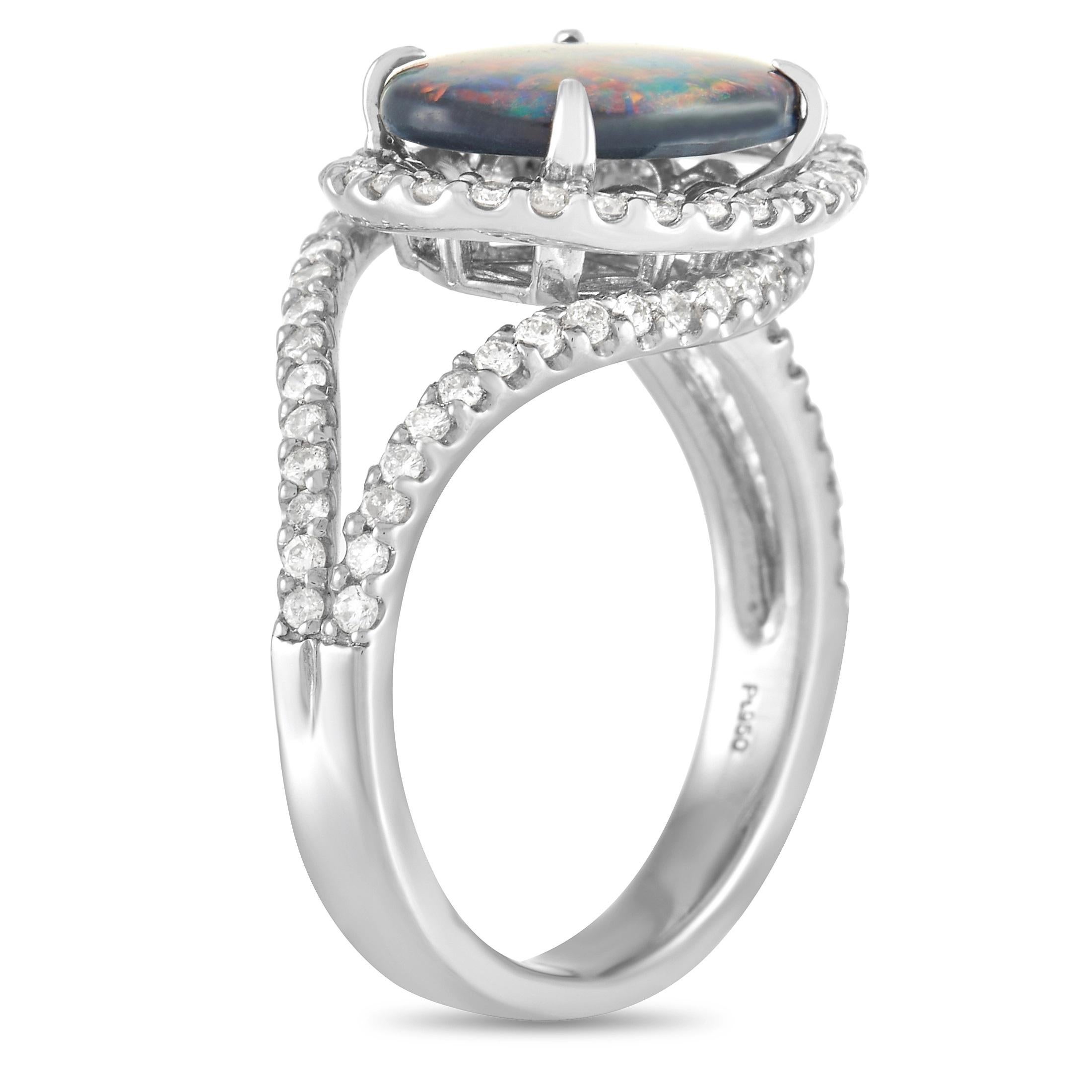 This exciting style pairs the fiery color of an elegant opal with the classic sparkle of traditional diamonds. At the center of this ring’s creative platinum setting, you’ll find an oval-shaped 1.88 carat opal that features a captivating color