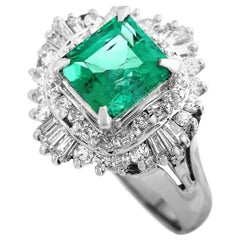 LB Exclusive Platinum 0.70 Carat Diamond and Emerald Ring