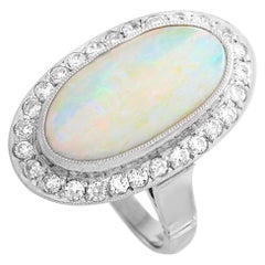 LB Exclusive Platinum 0.70 Carat Diamond and Opal Ring