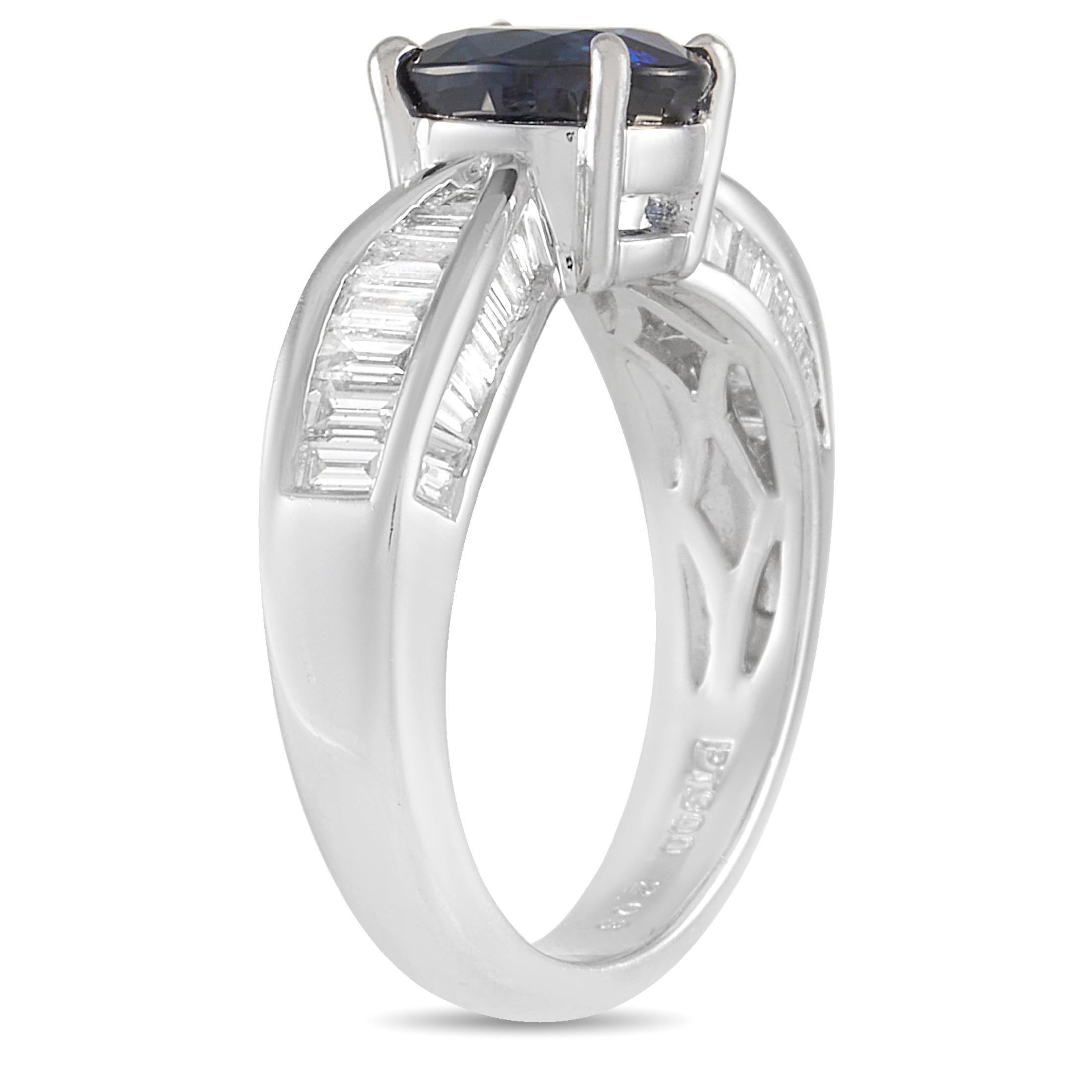 Sleek and sophisticated, this luxury ring features a Platinum band that comes to life thanks to inset step-cut diamonds totaling 0.73 carats. A deep blue oval-cut 2.03 carat sapphire center stone adds a touch of color to this elegant, understated