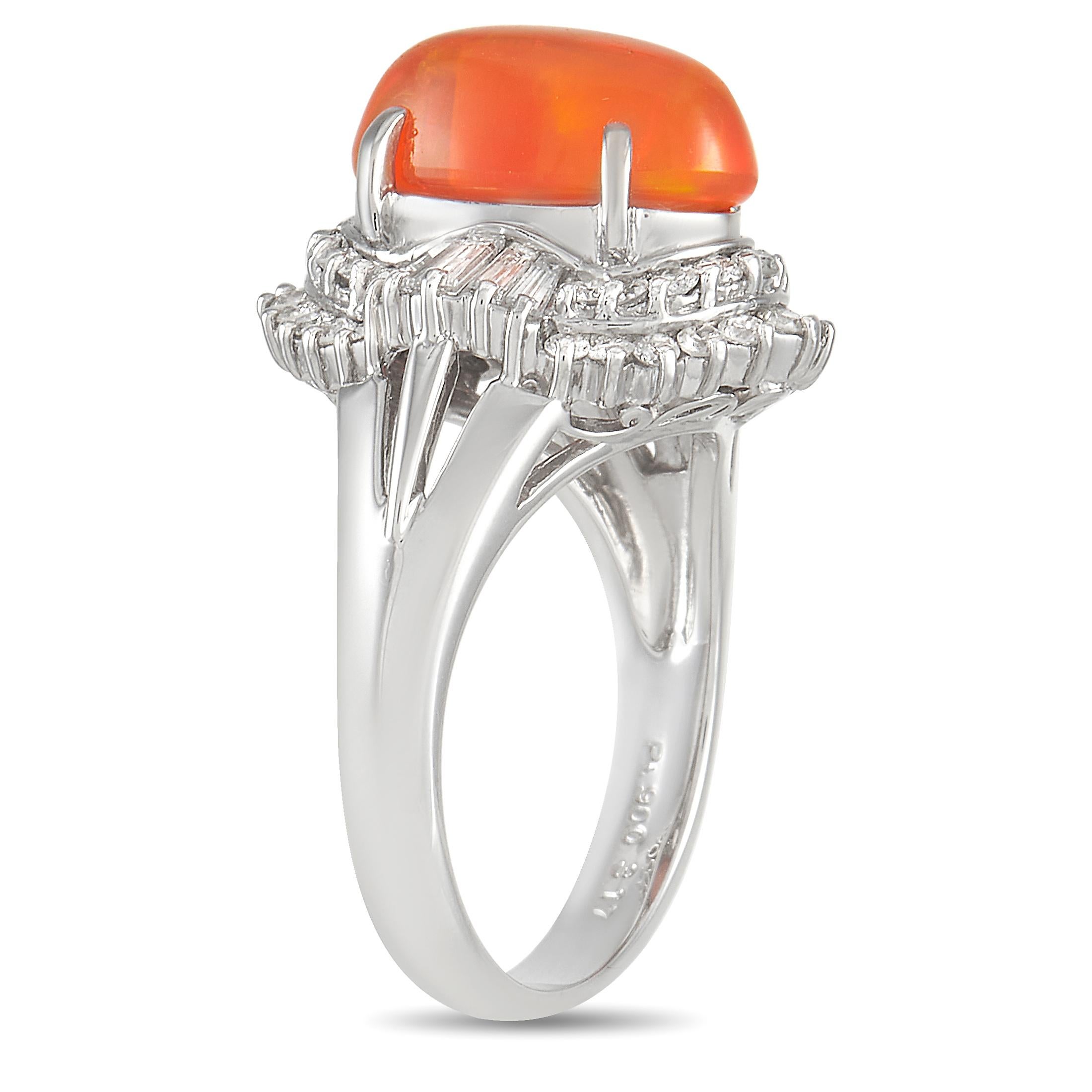 Stunning and spectacular in design, the beauty of this ring begins with the luxurious platinum setting. At the center, you’ll find an oval-cut 3.17 carat opal, which makes a statement thanks to its captivating orange hue. It’s surrounded by a