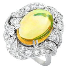 LB Exclusive Platinum 0.95 Carat Diamond and Opal Oval Ring