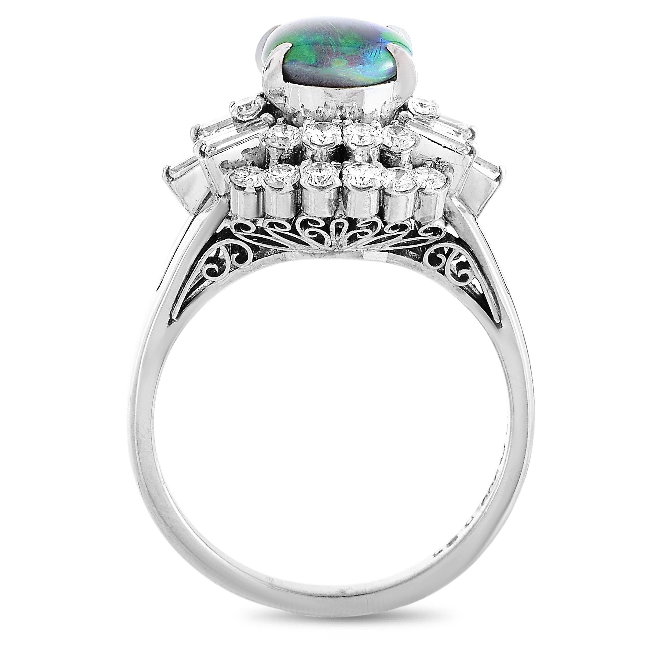 This LB Exclusive ring is crafted from platinum and weighs 8.3 grams, boasting band thickness of 3 mm and top height of 10 mm, while top dimensions measure 15 by 15 mm. The ring is set with a 1.08 ct opal and a total of 0.95 carats of diamonds.
Ring