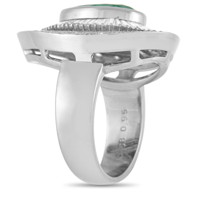 Enhance your jewelry collection by introducing this opulent ring. A 3.31 carat pear-shaped emerald center stone adds a stylish pop of color to this luxury piece, which possesses a 6mm wide band and an 11mm top height. But it’s the double halo of