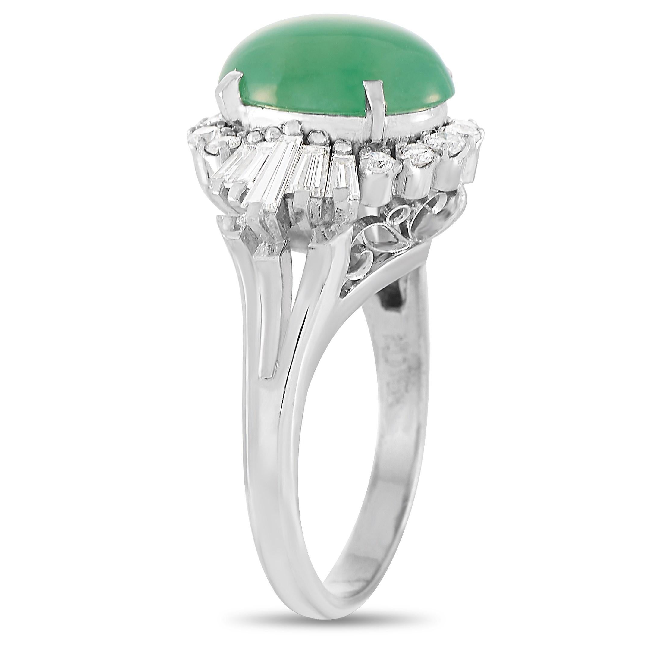 This pretty LB Exclusive ring will brighten up any day. The band is made with platinum and set with a halo of baguette and round diamonds totaling 1.05 carats around a 3.45 carat oval jade center stone. The ring has a band thickness of 3 mm, a top
