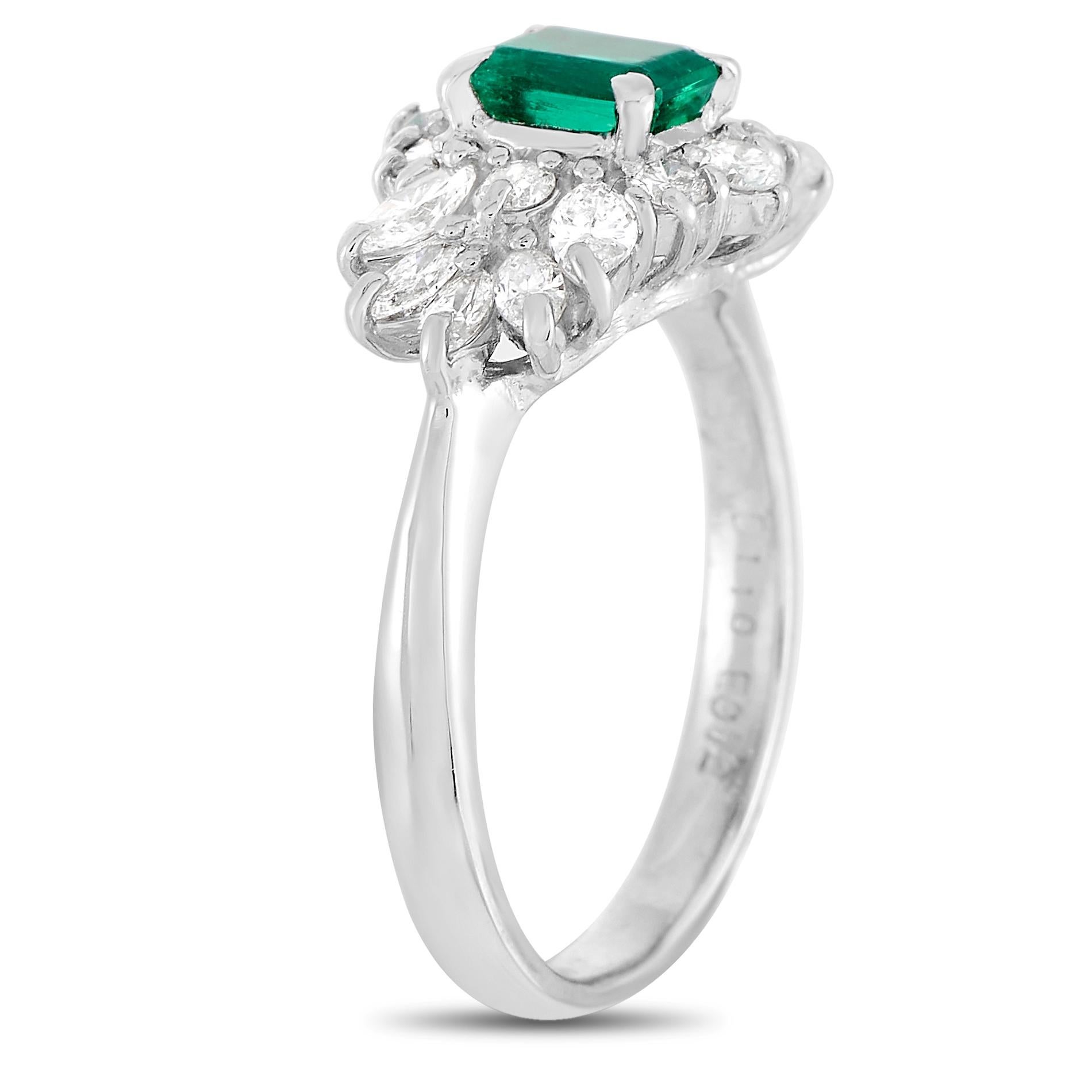 This pretty LB Exclusive Platinum 1.10 ct Diamond and Emerald Ring is made with platinum and set with a total of 1.10 carats of diamonds forming a halo around the 0.72 carat emerald center stone. The ring has a band thickness of 2 mm, a top height