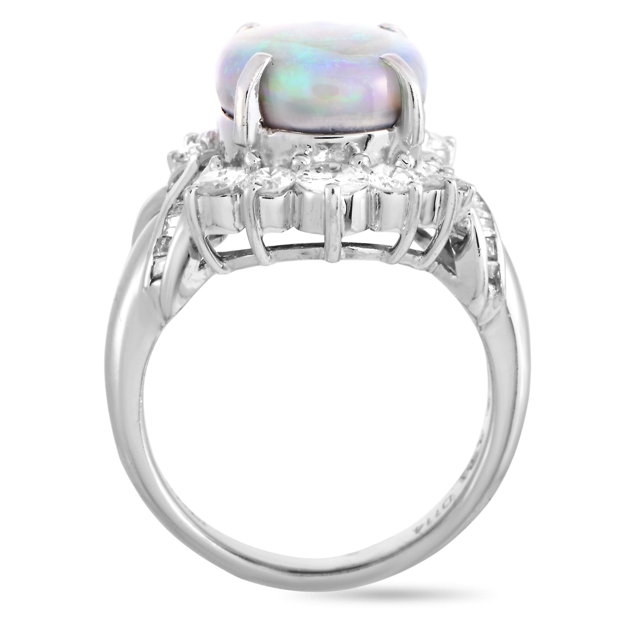 This LB Exclusive ring is made of platinum and set with a 3.63 ct opal and a total of 1.14 carats of diamonds. The ring weighs 10.3 grams, boasting band thickness of 2 mm and top height of 9 mm, while top dimensions measure 20 by 15 mm.
 
 Offered