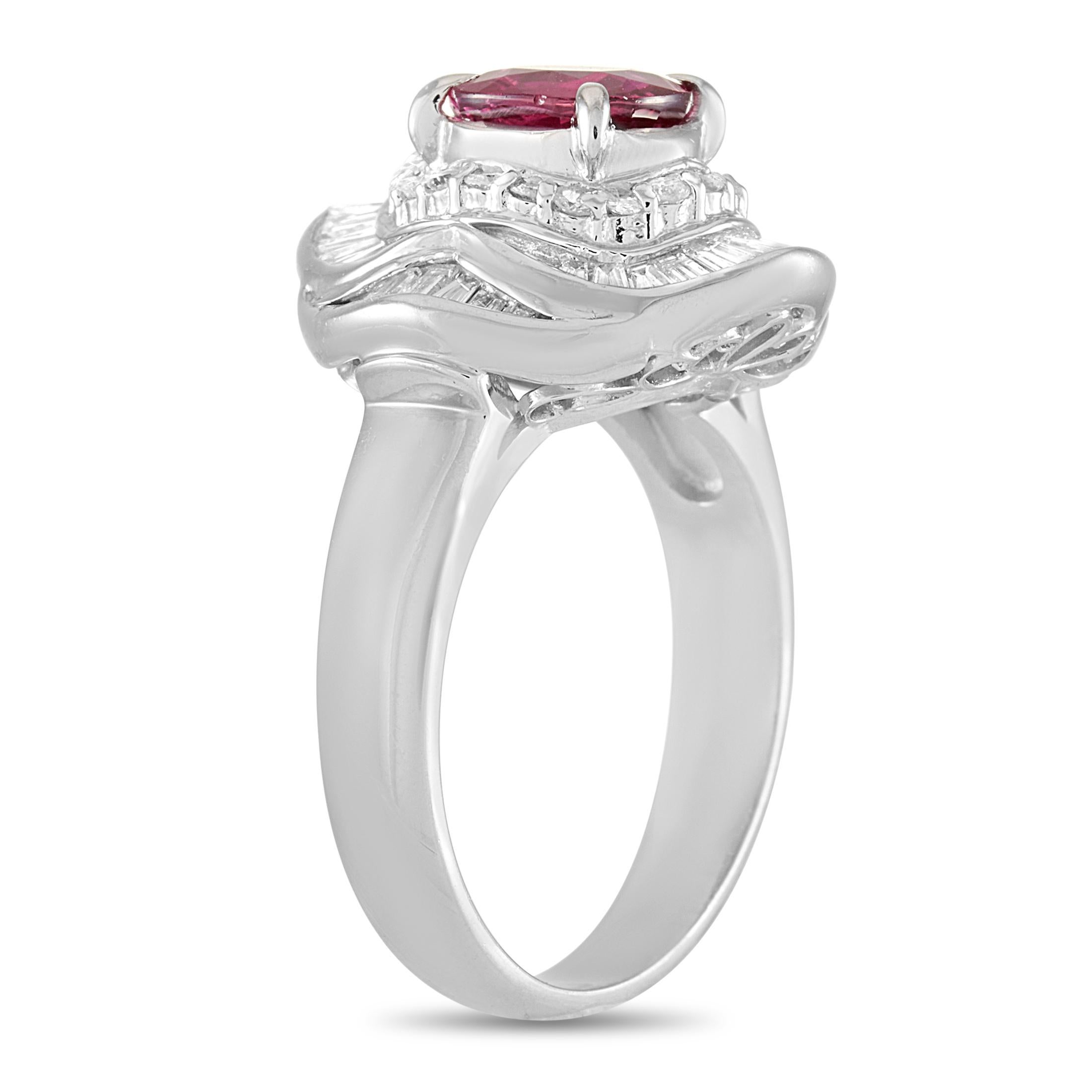 This LB Exclusive ring is crafted from platinum and weighs 12 grams. It boasts band thickness of 4 mm and top height of 9 mm, while top dimensions measure 17 by 16 mm. The ring is set with a 1.68 ct ruby and a total of 1.15 carats of diamonds.
