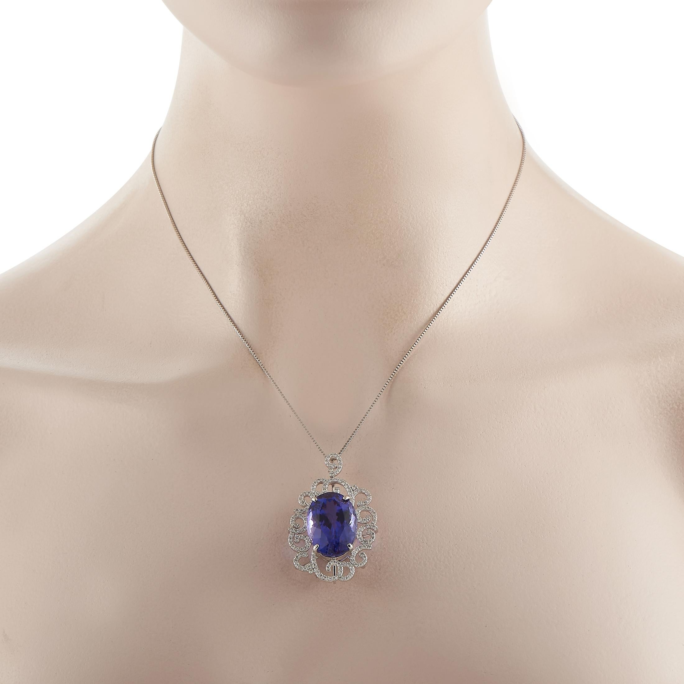 There’s something elegant and feminine about this impeccably crafted pendant necklace. Suspended from a sleek 17” box chain, you’ll find a pendant crafted from pure platinum that measures 1.5” long and 1” wide. Diamonds totaling 1.18 carats