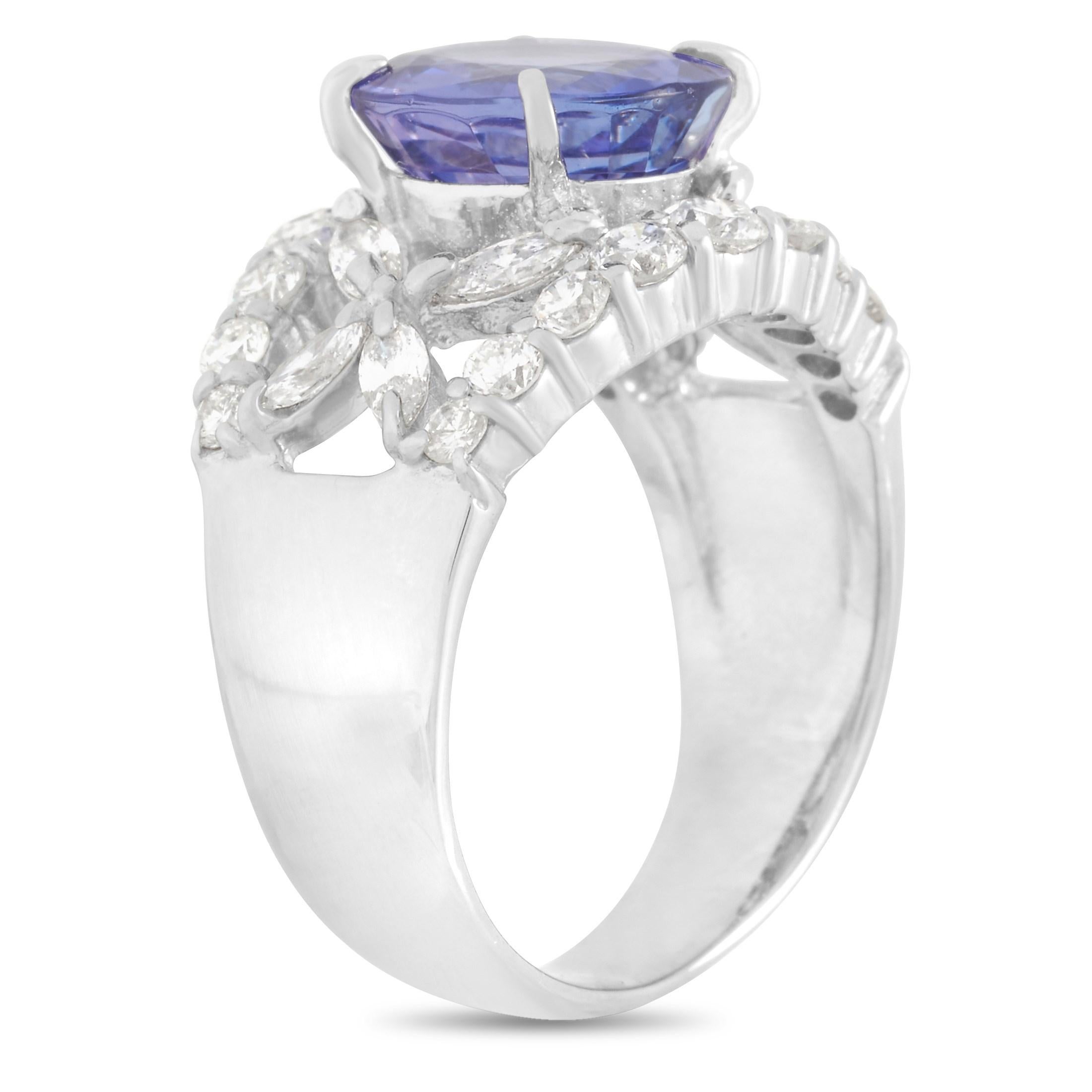 This beautiful LB Exclusive Platinum 1.22 ct Diamond 3.07 ct Tanzanite Ring is a classy statement piece The band is made with platinum and set with a total of 1.22 carats of round and marquise cut diamonds surrounding a gorgeous 3.07 carat round cut