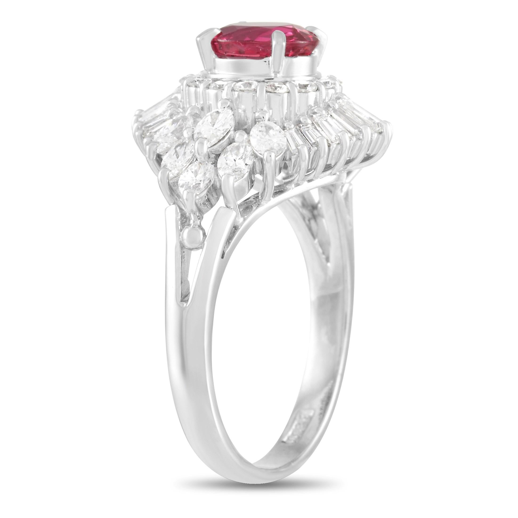 This bold LB Exclusive Platinum 1.30 ct Diamond 1.08 ct Ruby Ring is a glamorous statement piece made with platinum. The front of the ring is set with a total of 1.30 carats of round cut, marquise cut, and emerald cut diamonds, forming a