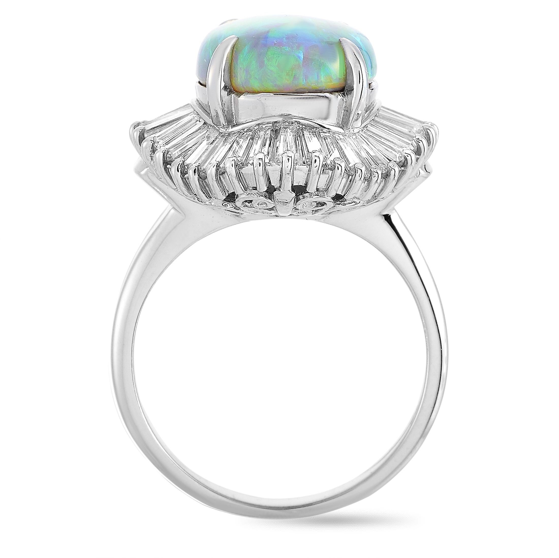This LB Exclusive ring is made of platinum and set with a 3.39 ct opal and a total of 1.32 carats of diamonds. The ring weighs 11.3 grams, boasting band thickness of 3 mm and top height of 10 mm, while top dimensions measure 20 by 17 mm.
 
 Offered
