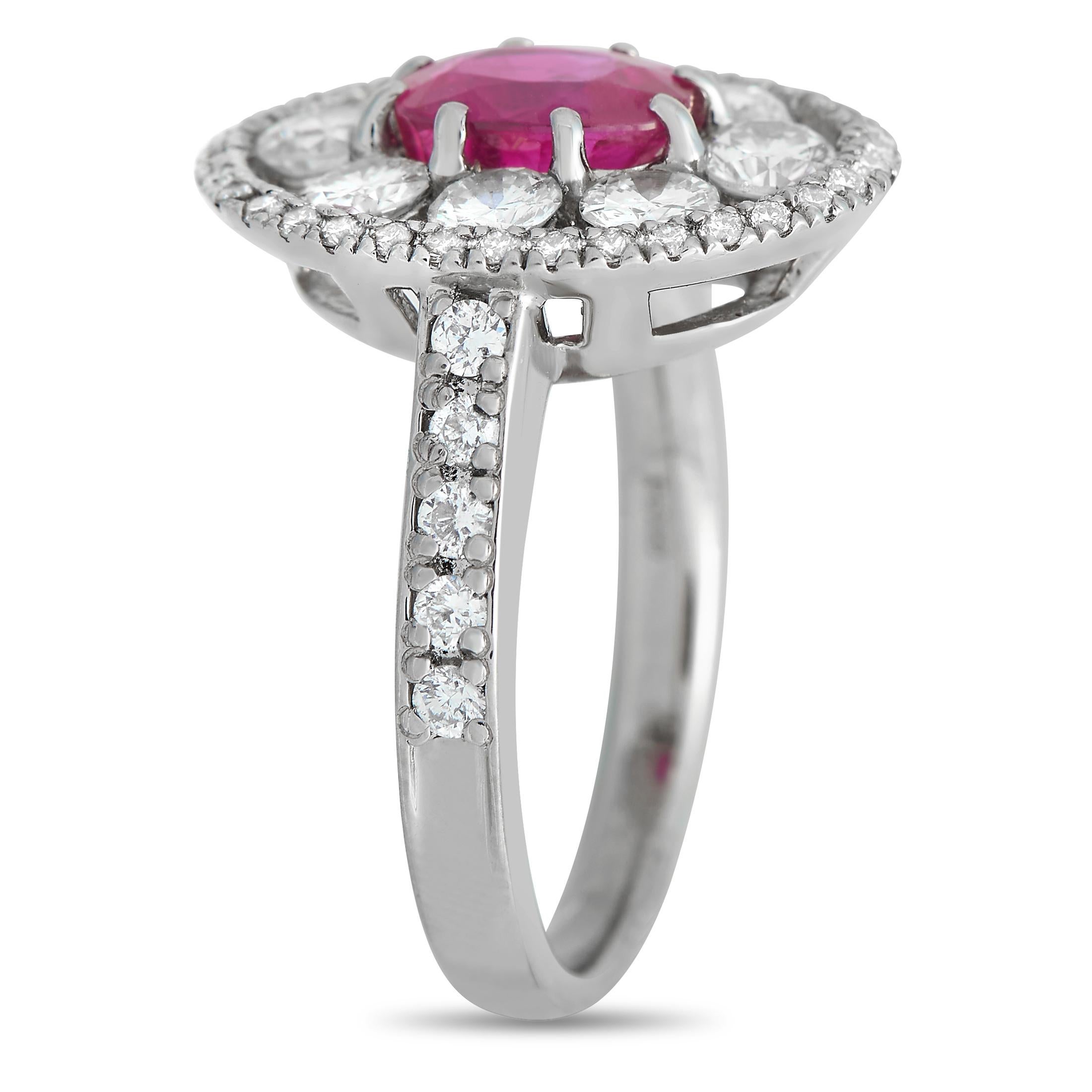 Bold, radiant, and incredibly impressible, this platinum ring is designed to make a statement. The dazzling 1.38 carat ruby center stone is elevated thanks to sparkling diamonds with a total weight of 1.33 carats. It features a 3mm wide band and a