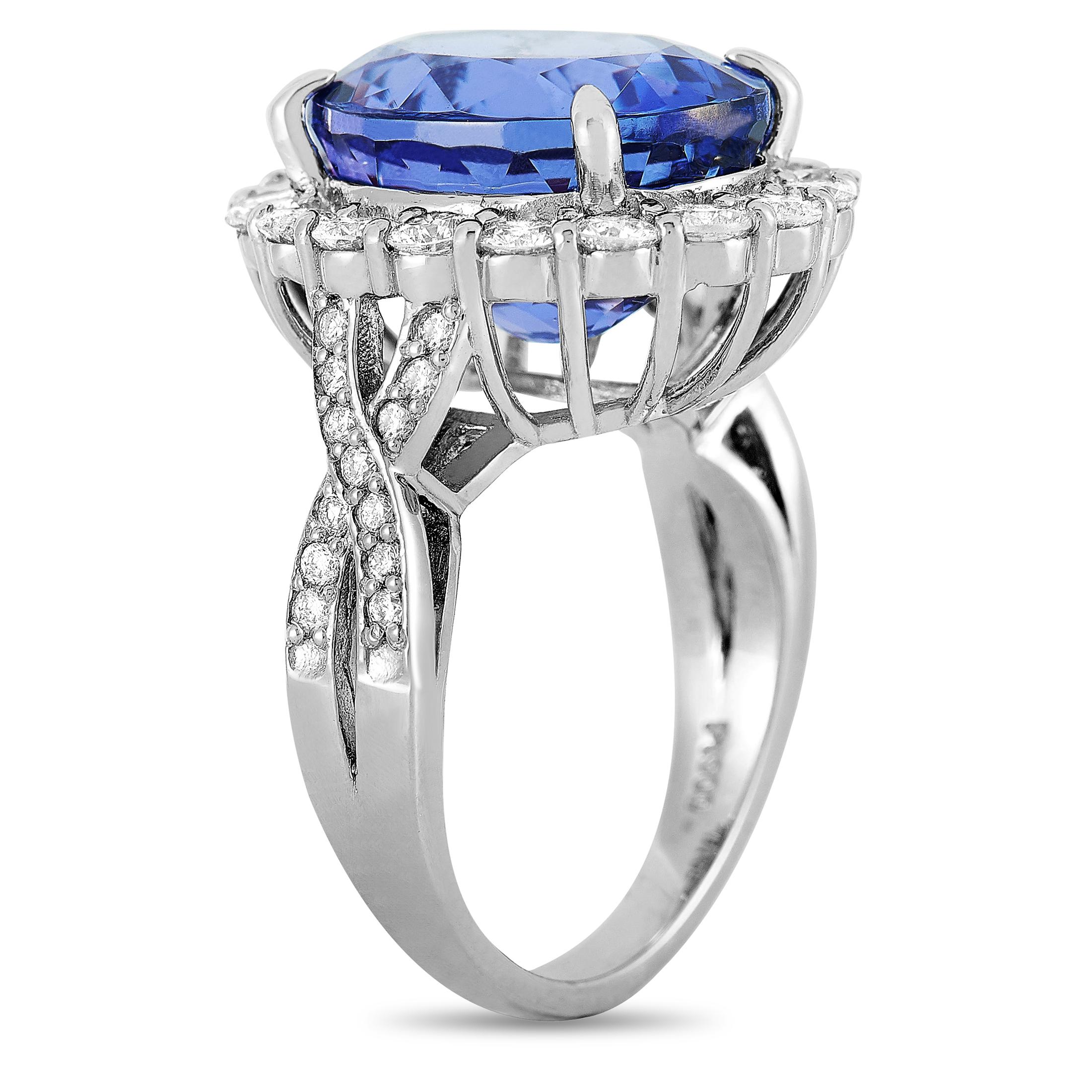 This LB Exclusive ring is made of platinum and embellished with an 11.52 ct tanzanite and a total of 1.60 carats of diamonds. The ring weighs 12.8 grams and boasts band thickness of 3 mm and top height of 10 mm, while top dimensions measure 16 by 20