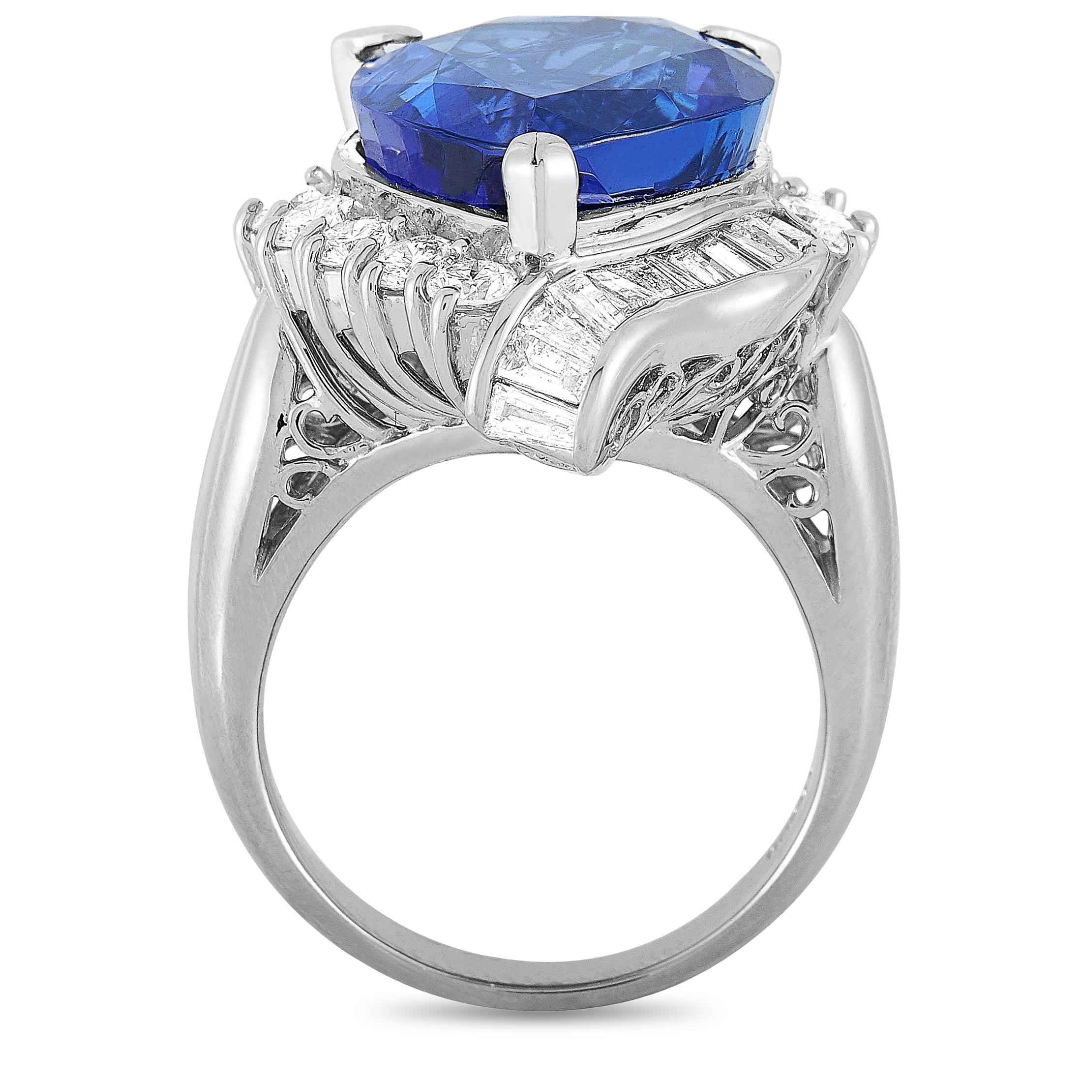 This LB Exclusive ring is made of platinum and embellished with a tanzanite that weighs 15.81 carats and a total of 2.10 carats of diamonds. The ring weighs 23.9 grams and boasts band thickness of 3 mm and top height of 13 mm, while top dimensions