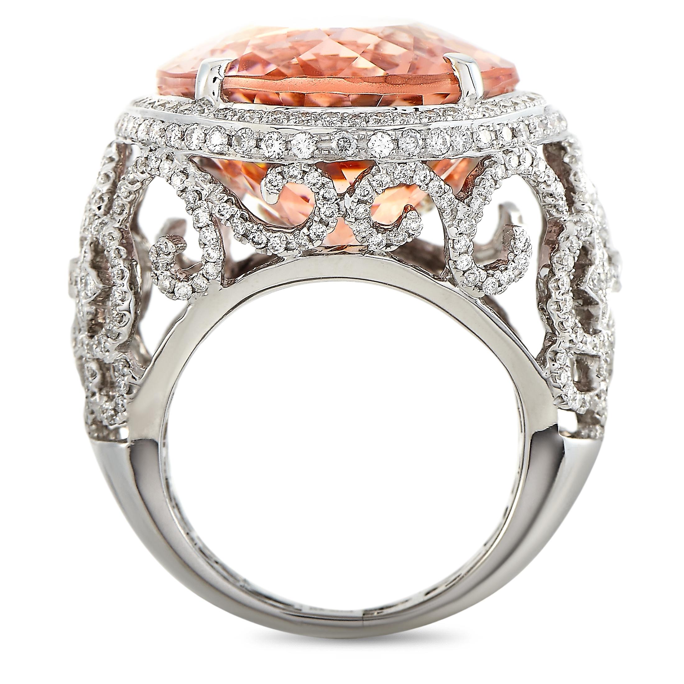This LB Exclusive ring is crafted from platinum and weighs 22.5 grams, boasting band thickness of 6 mm and top height of 12 mm, while top dimensions measure 27 by 25 mm. The ring is set with a 33.46 ct morganite and a total of 2.20 carats of
