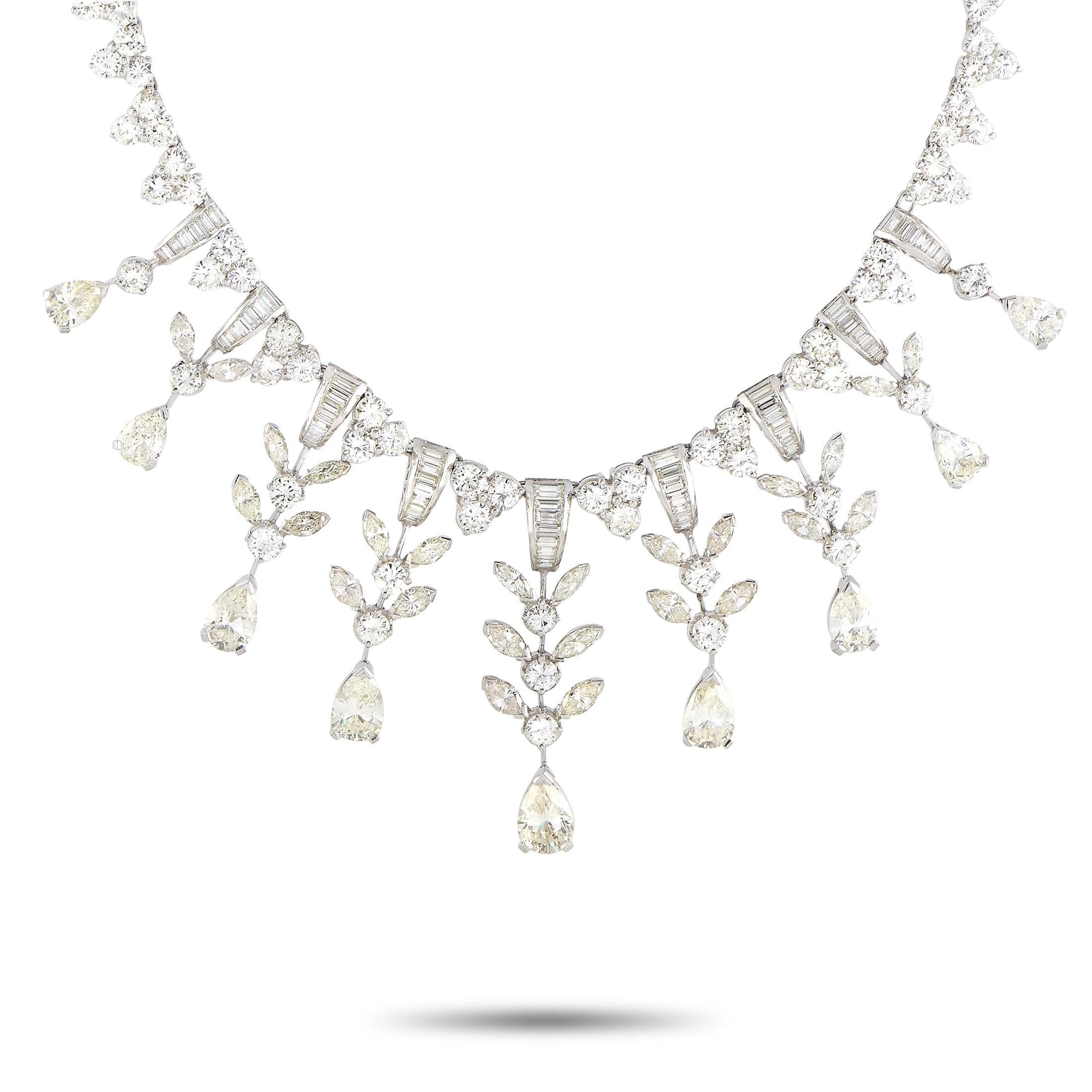 A showstopping piece of bridal jewelry, this LB Exclusive Platinum Diamond Necklace shimmers with 45 carats of round, pear, and marquise diamonds. The necklace is lined with trio clusters of round diamonds and has a 1.5-inch by 4-inch vine-drop