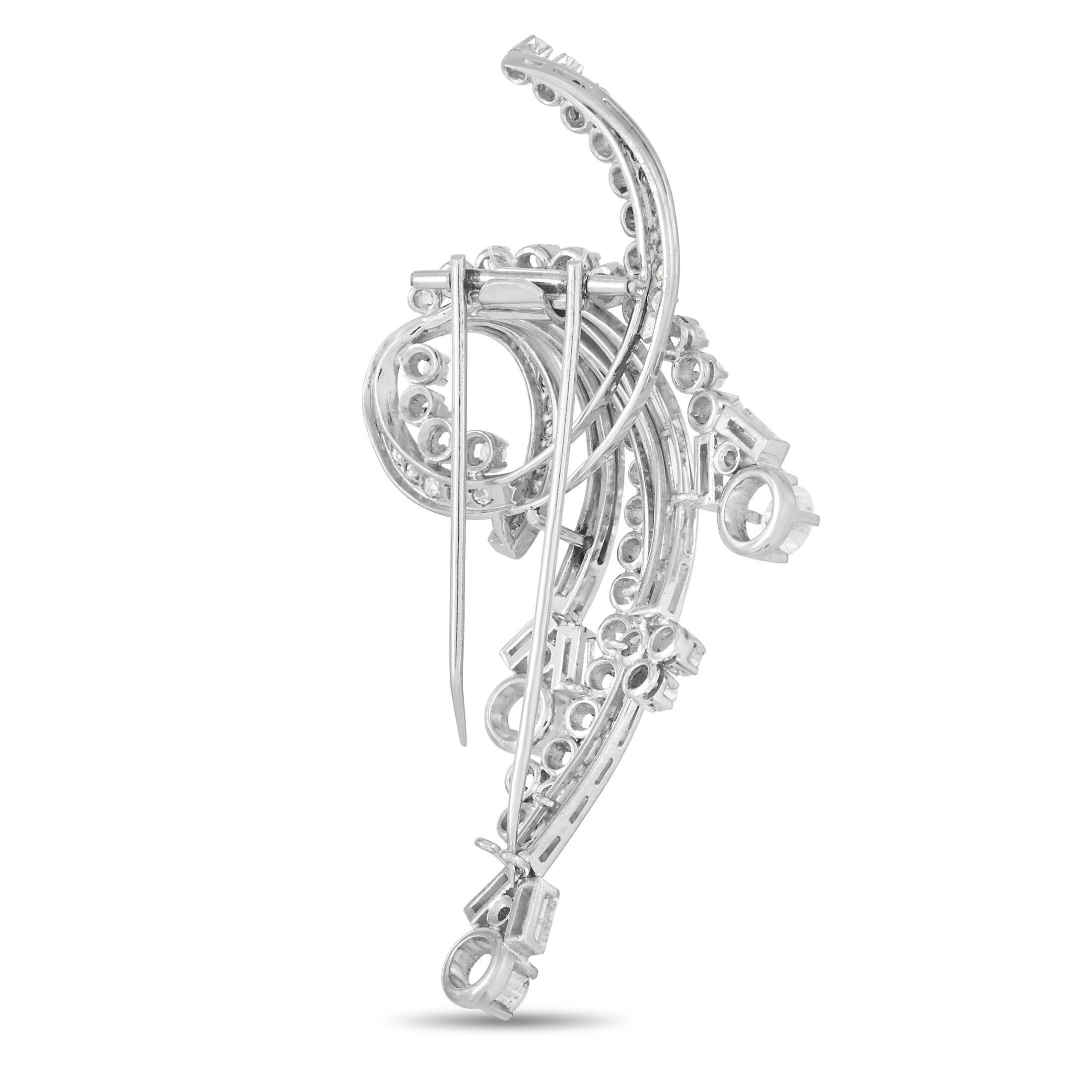 A glistening brooch crafted in solid platinum and embellished with diamonds of different cuts, this LB Exclusive Art Deco Style Diamond Pin would make a dazzling addition to any outfit. It features an abstract floral swirl motif allowing you to wear
